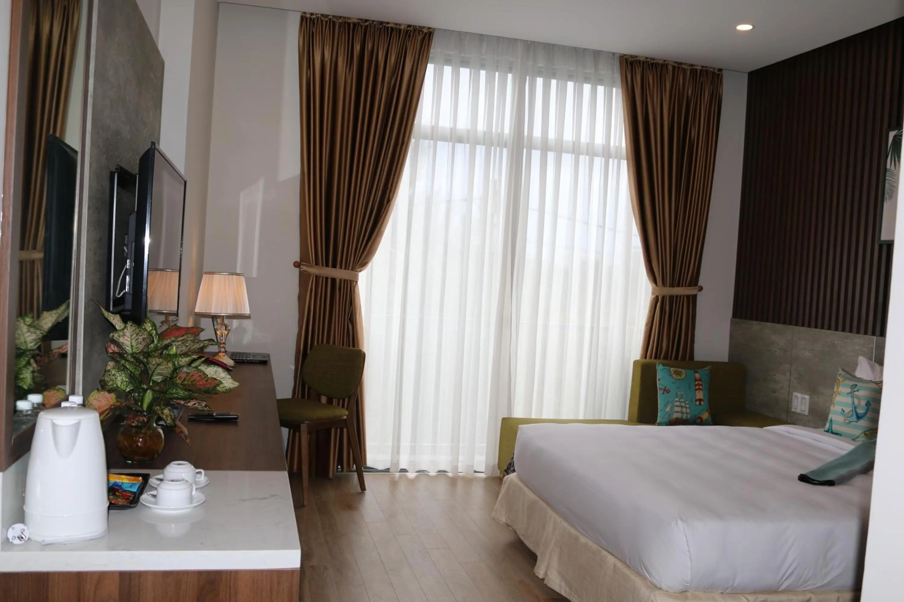 Bed in The Fish Village Villa