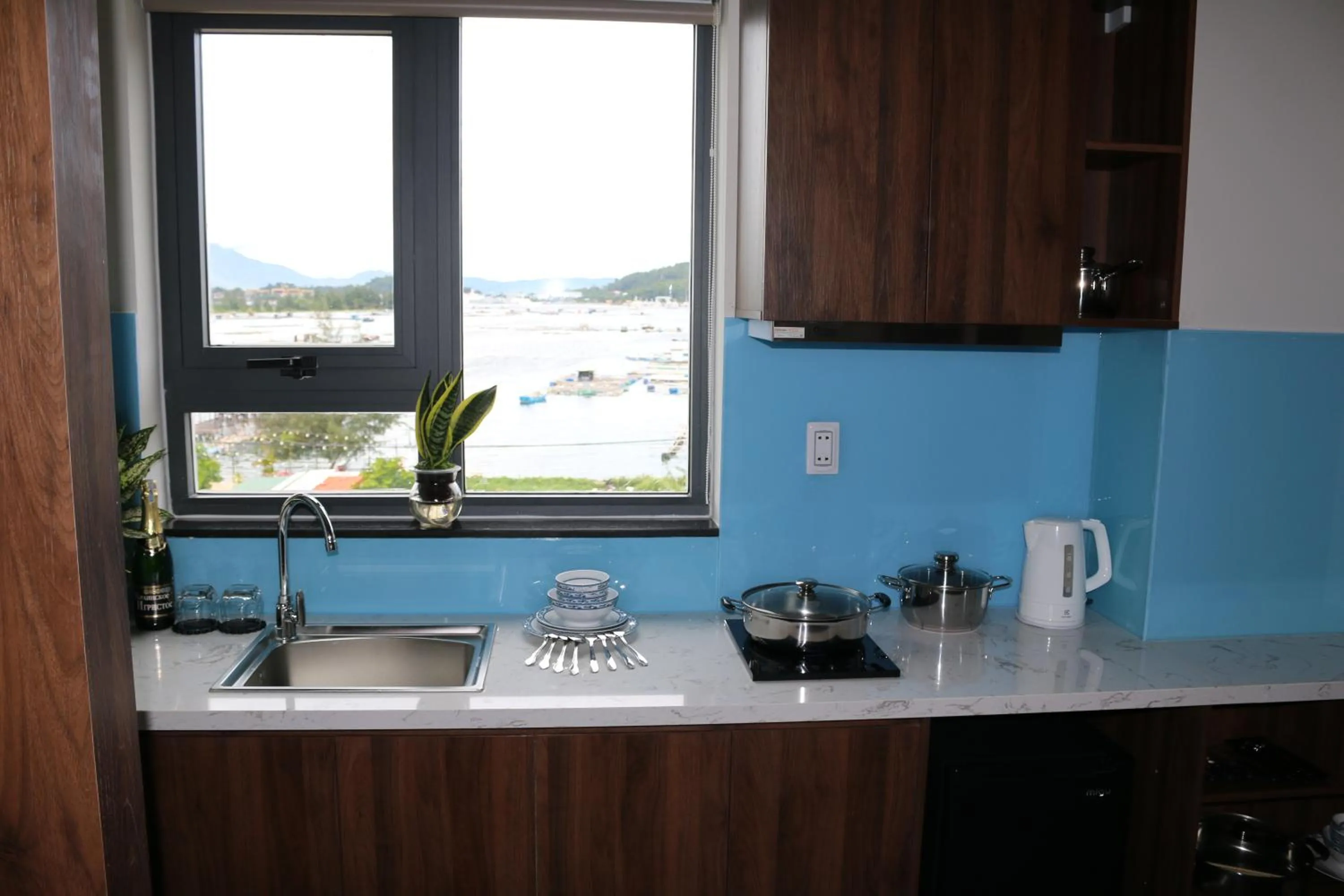 Kitchen or kitchenette in The Fish Village Villa