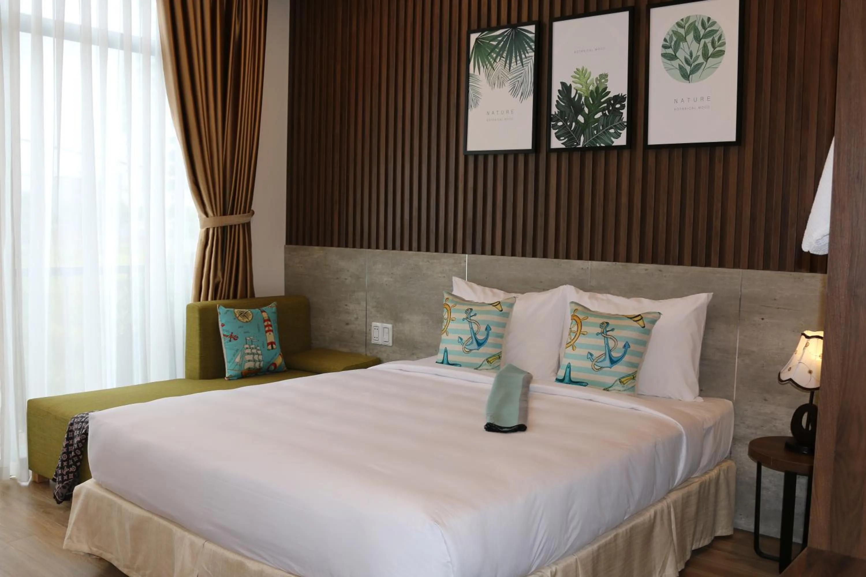 Bed in The Fish Village Villa