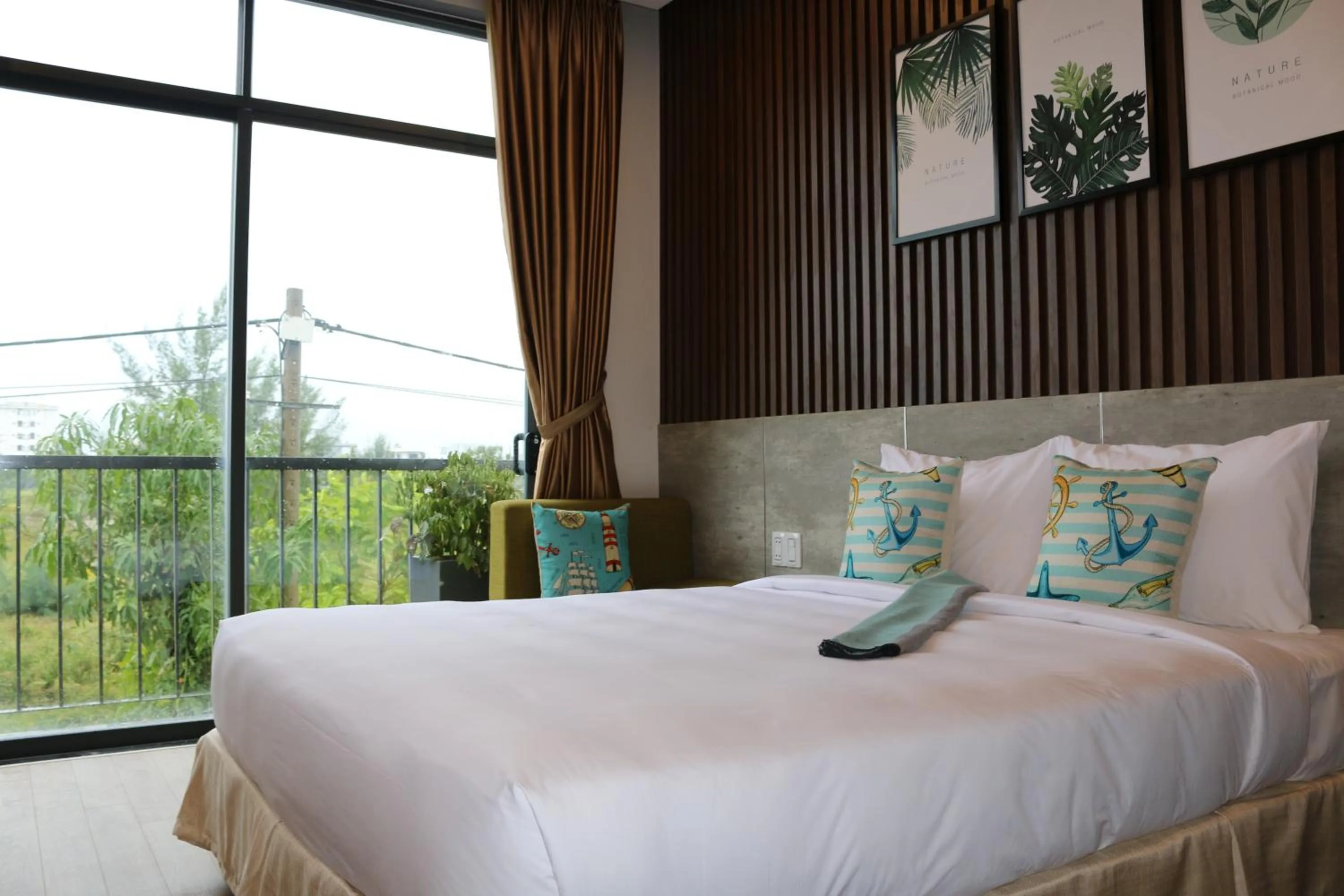 Bed in The Fish Village Villa