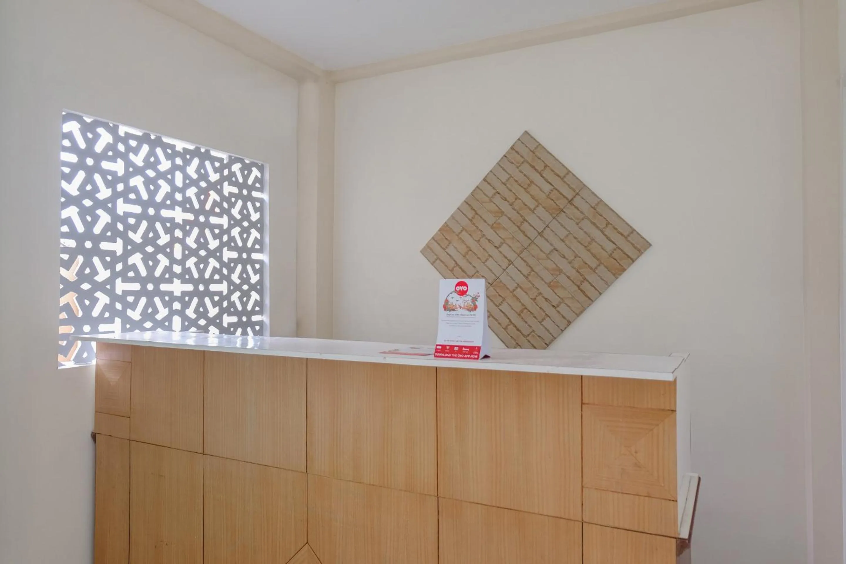 Lobby or reception in OYO Flagship 1603 Antosa Family Residence Silver Key