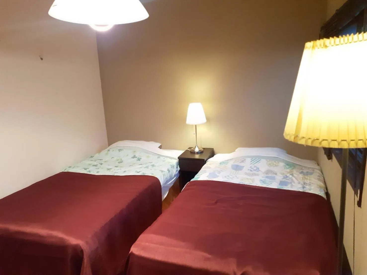 Bed in HAKUBA IKEDA LIFE KAN APARTMENTS