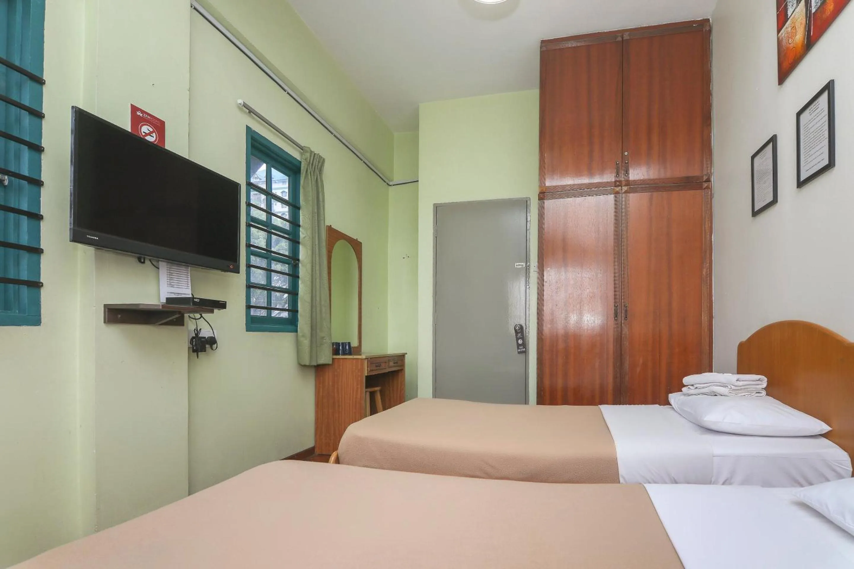 Bedroom, Bed in SPOT ON 89789 Hotel Check In 2