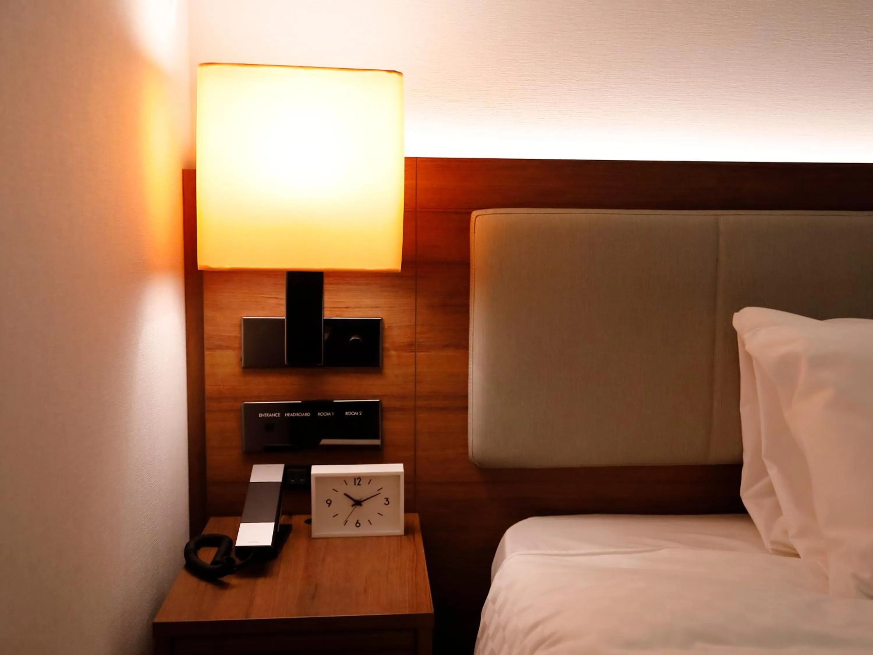 Bed in HOTEL FORZA HAKATAEKI CHIKUSHIGUCHI Ⅱ