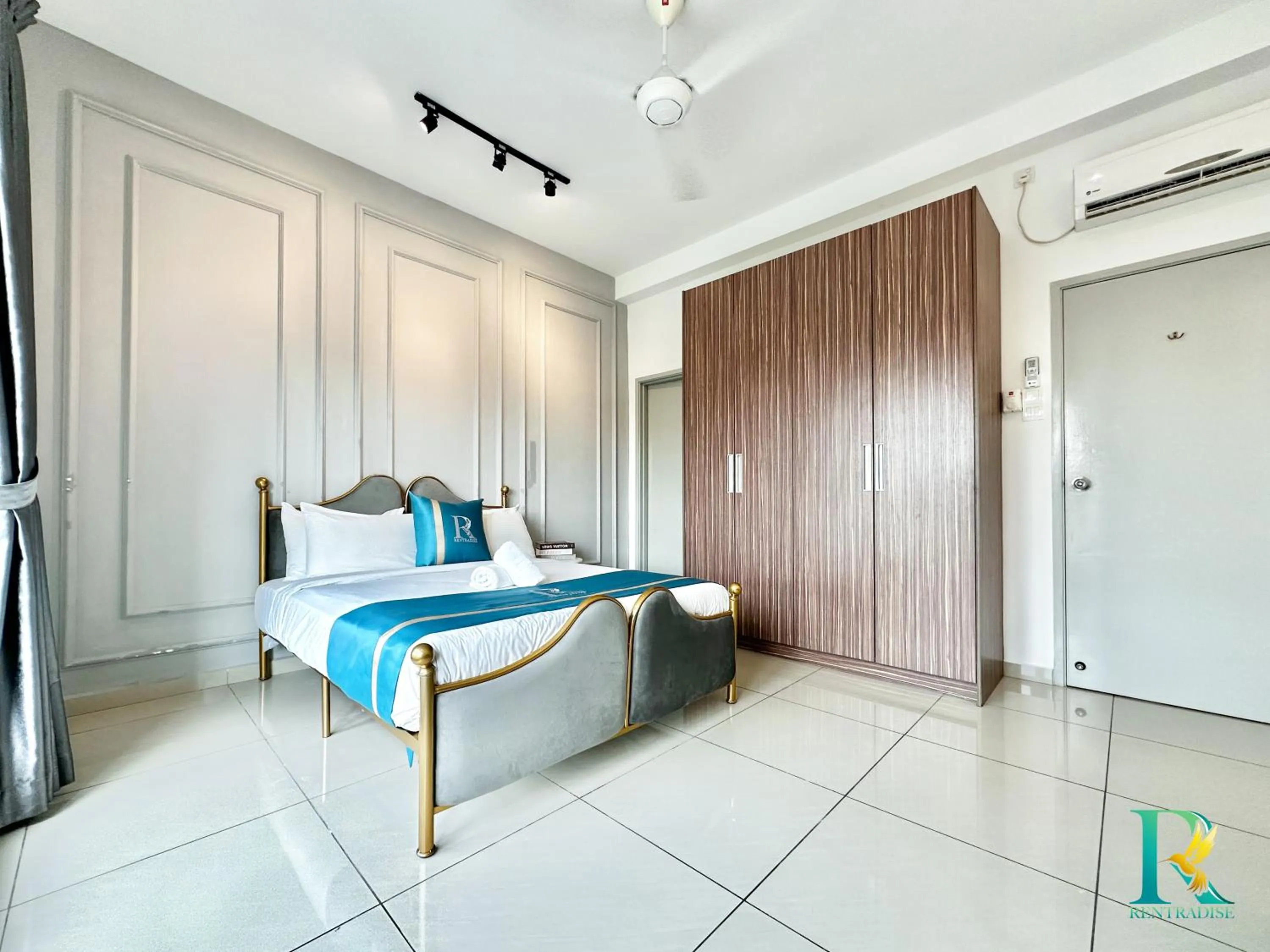 Bed in Seasons Luxury Apartment By RR JBcity