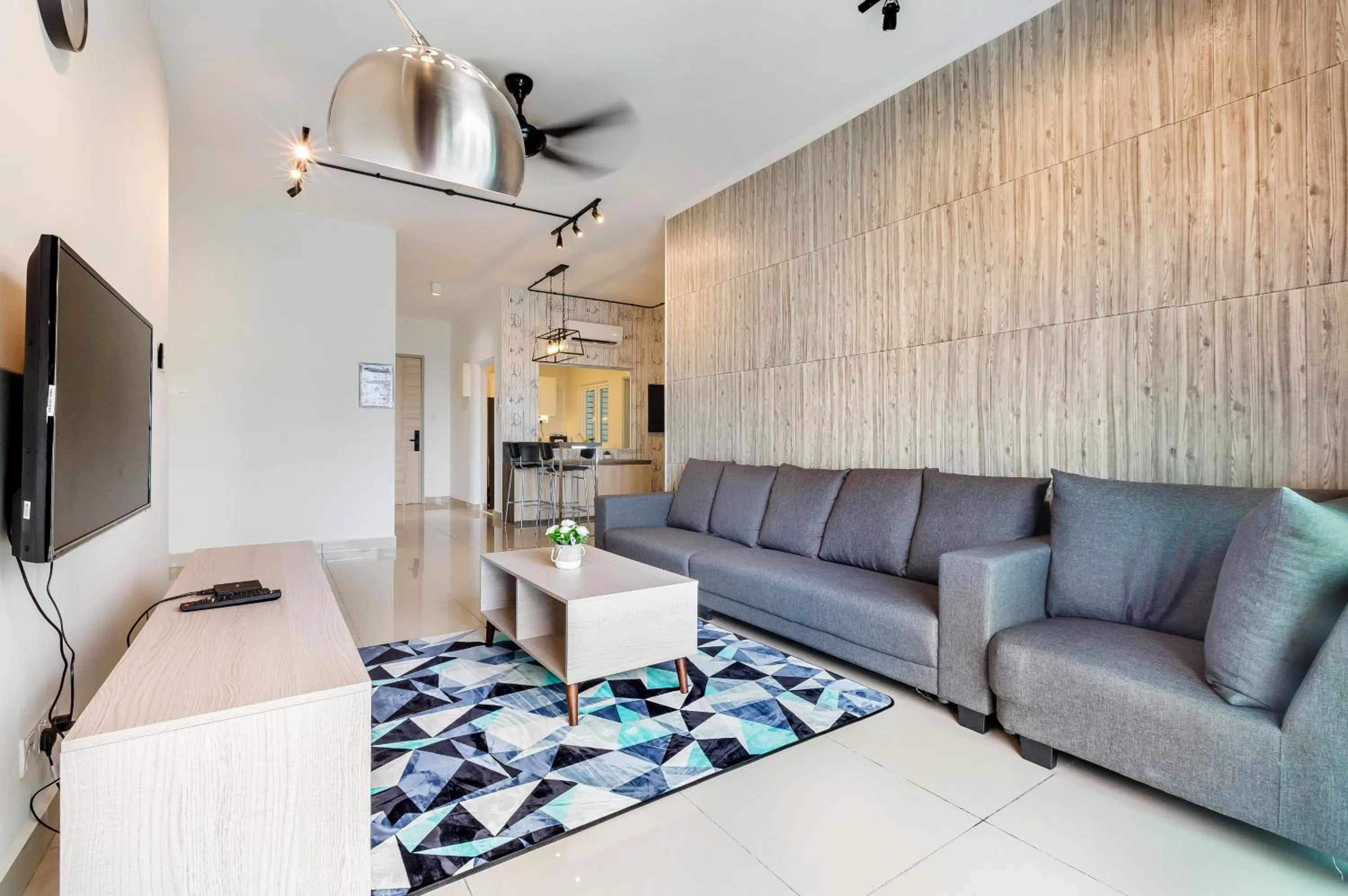 Living room in Seasons Luxury Apartment By RR JBcity