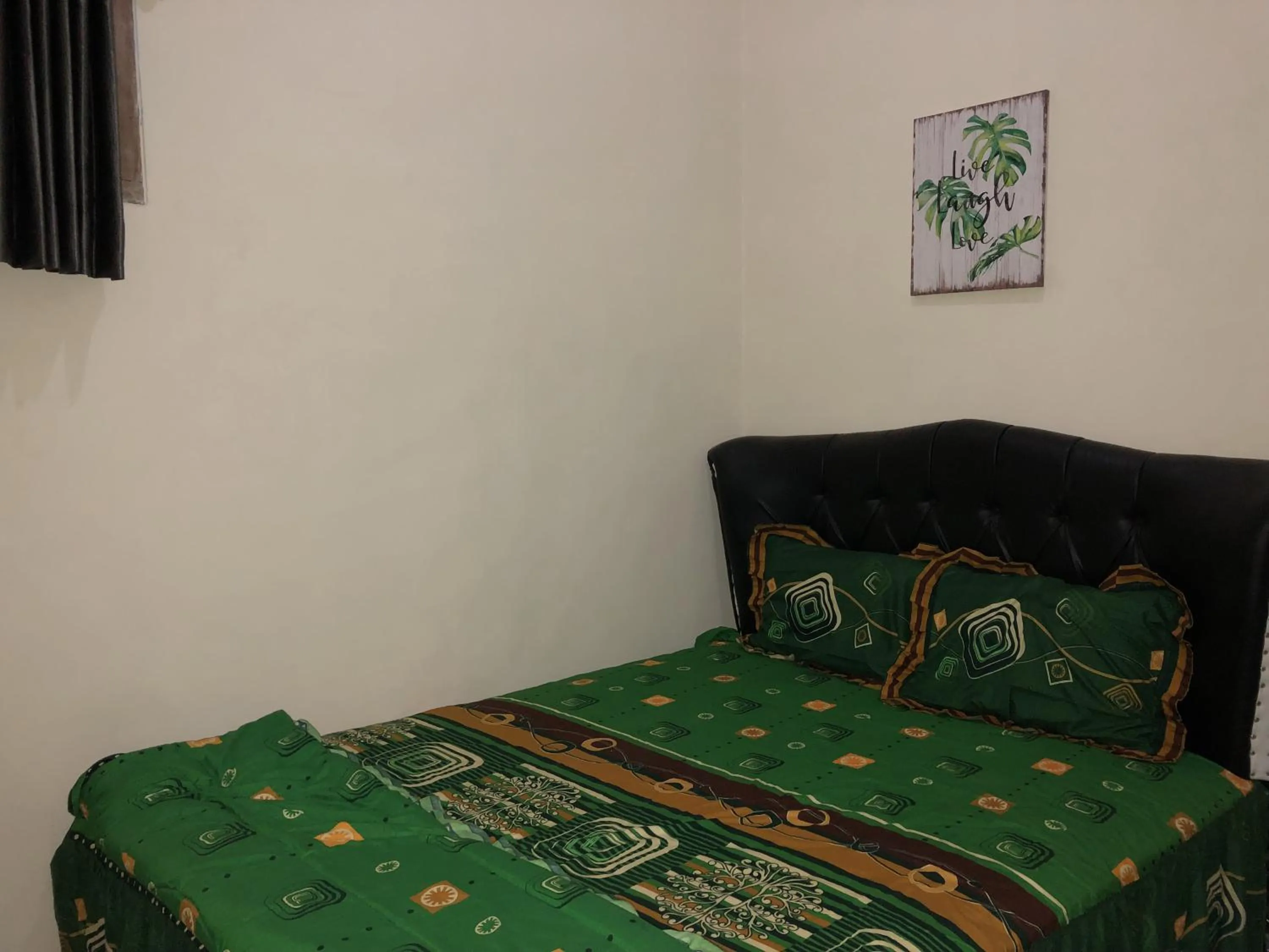 Photo of the whole room, Bed in Rumah Singgah BRM
