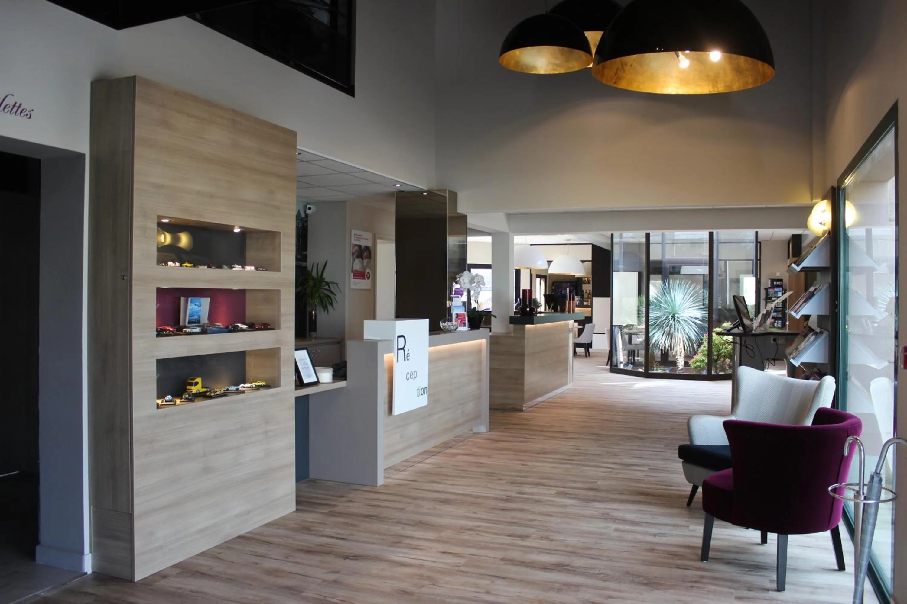 Lobby or reception in The Originals Boutique, Hôtel La Chaussairie, Rennes Sud