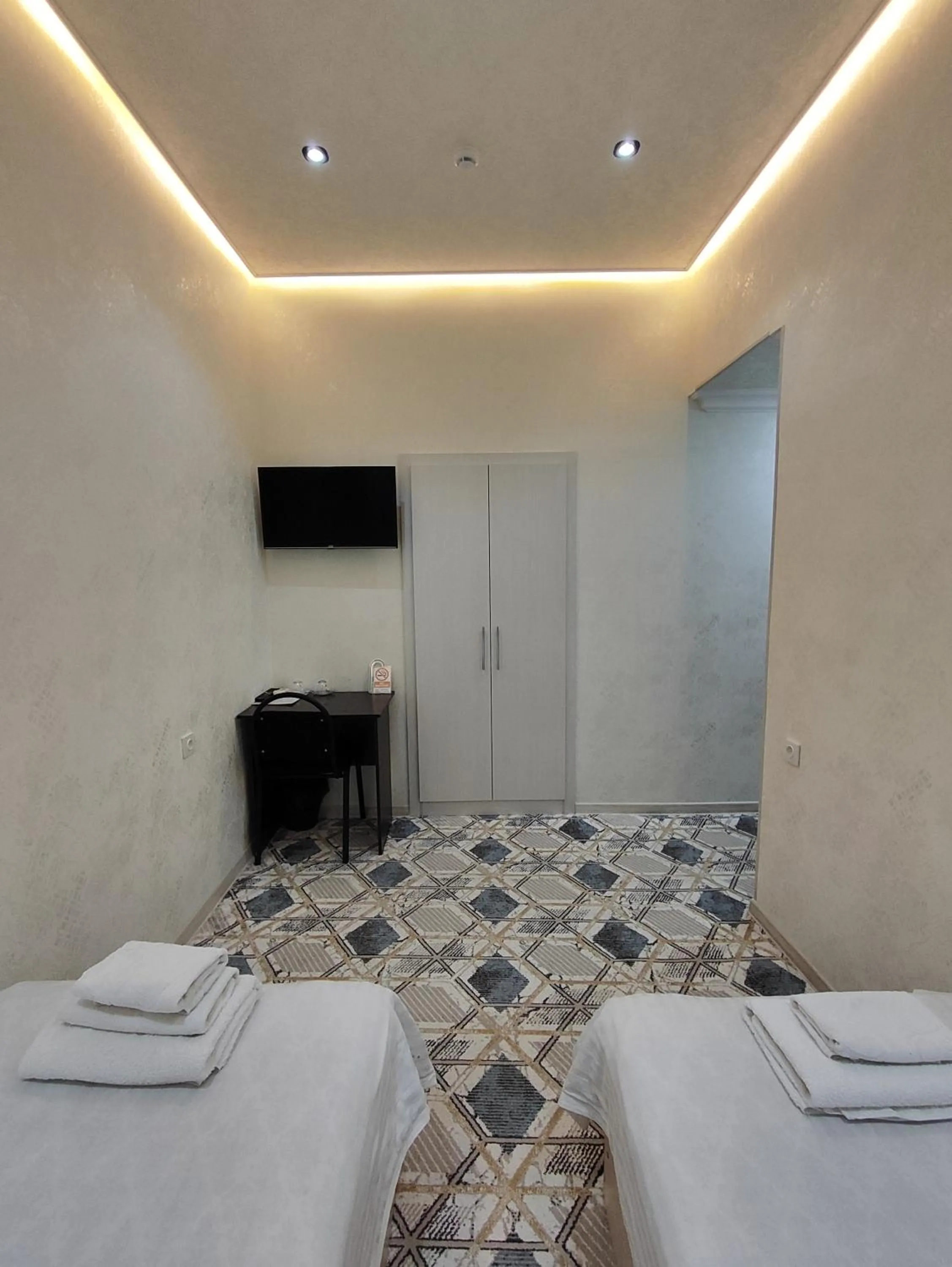 wardrobe, Bed in Hotel Suzani Samarkand