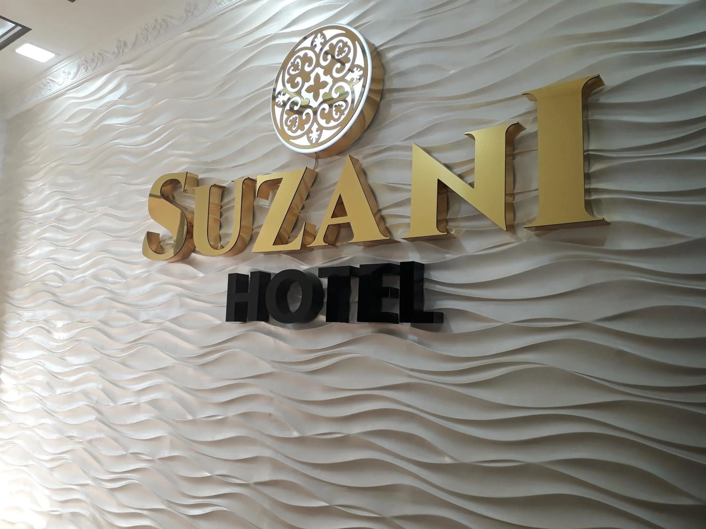 Property logo or sign in Hotel Suzani Samarkand