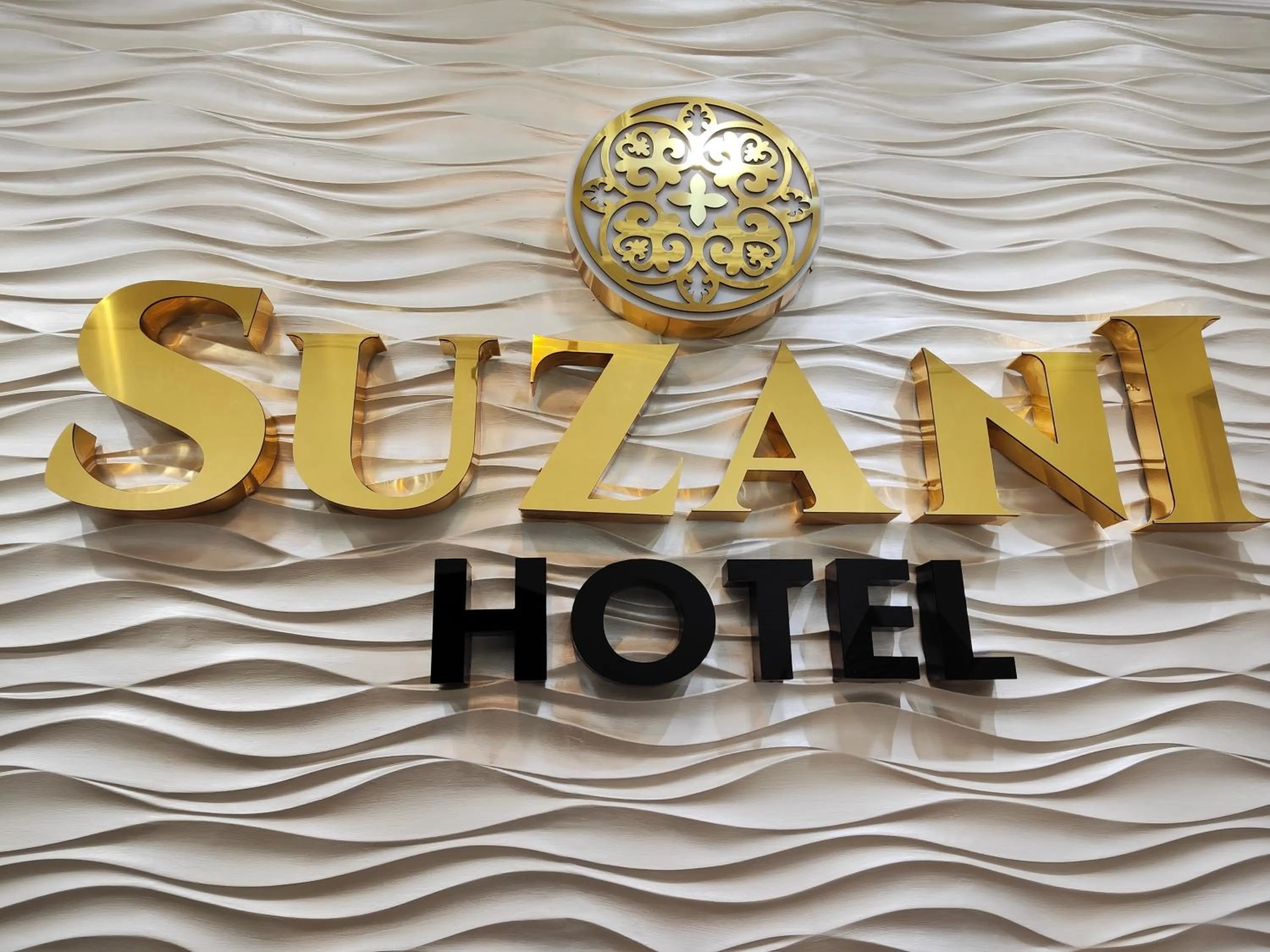 Property logo or sign in Hotel Suzani Samarkand