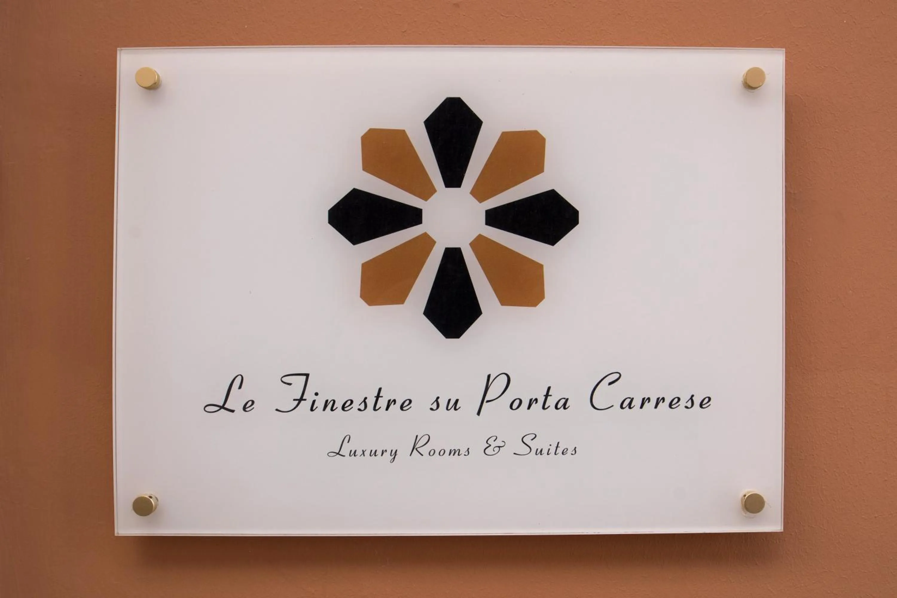 Property logo or sign in Le Finestre Su Porta Carrese - Luxury Rooms