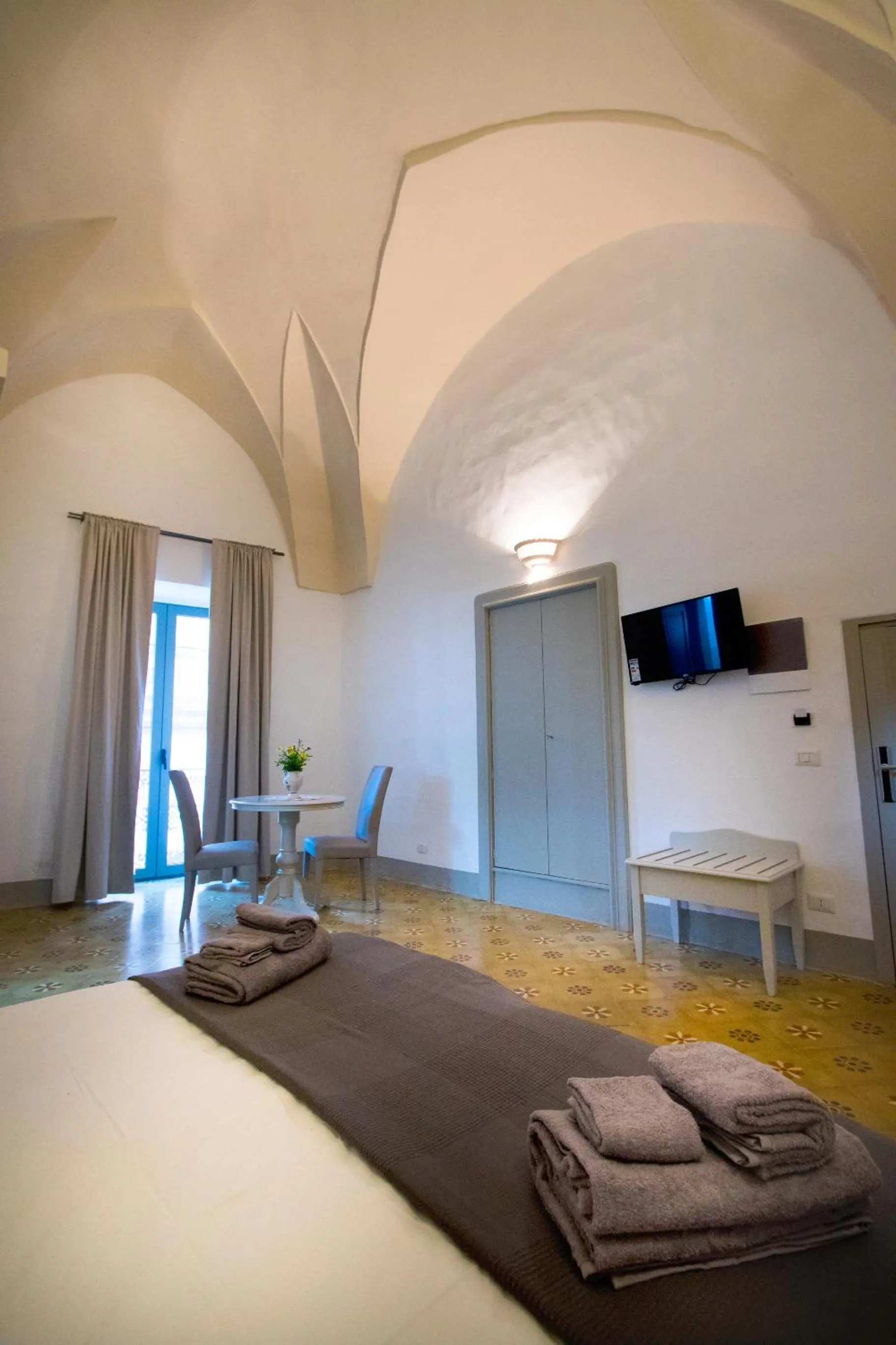 TV and multimedia in Le Finestre Su Porta Carrese - Luxury Rooms