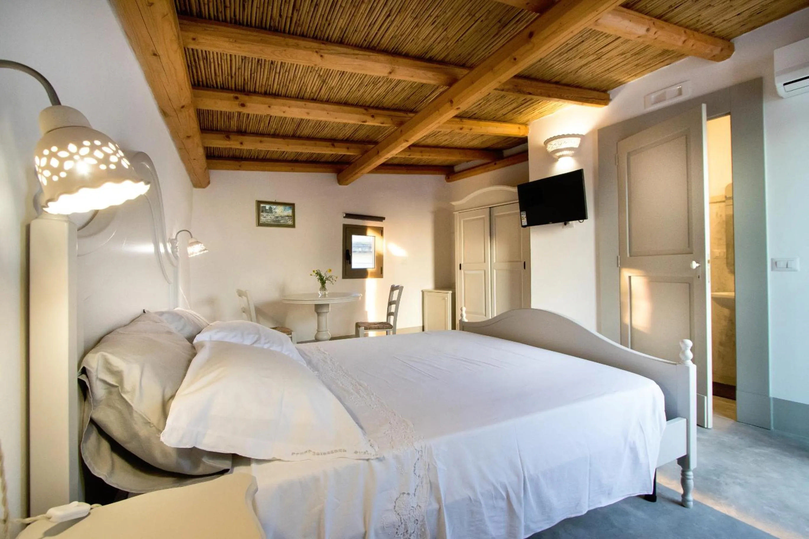 Bed in Le Finestre Su Porta Carrese - Luxury Rooms