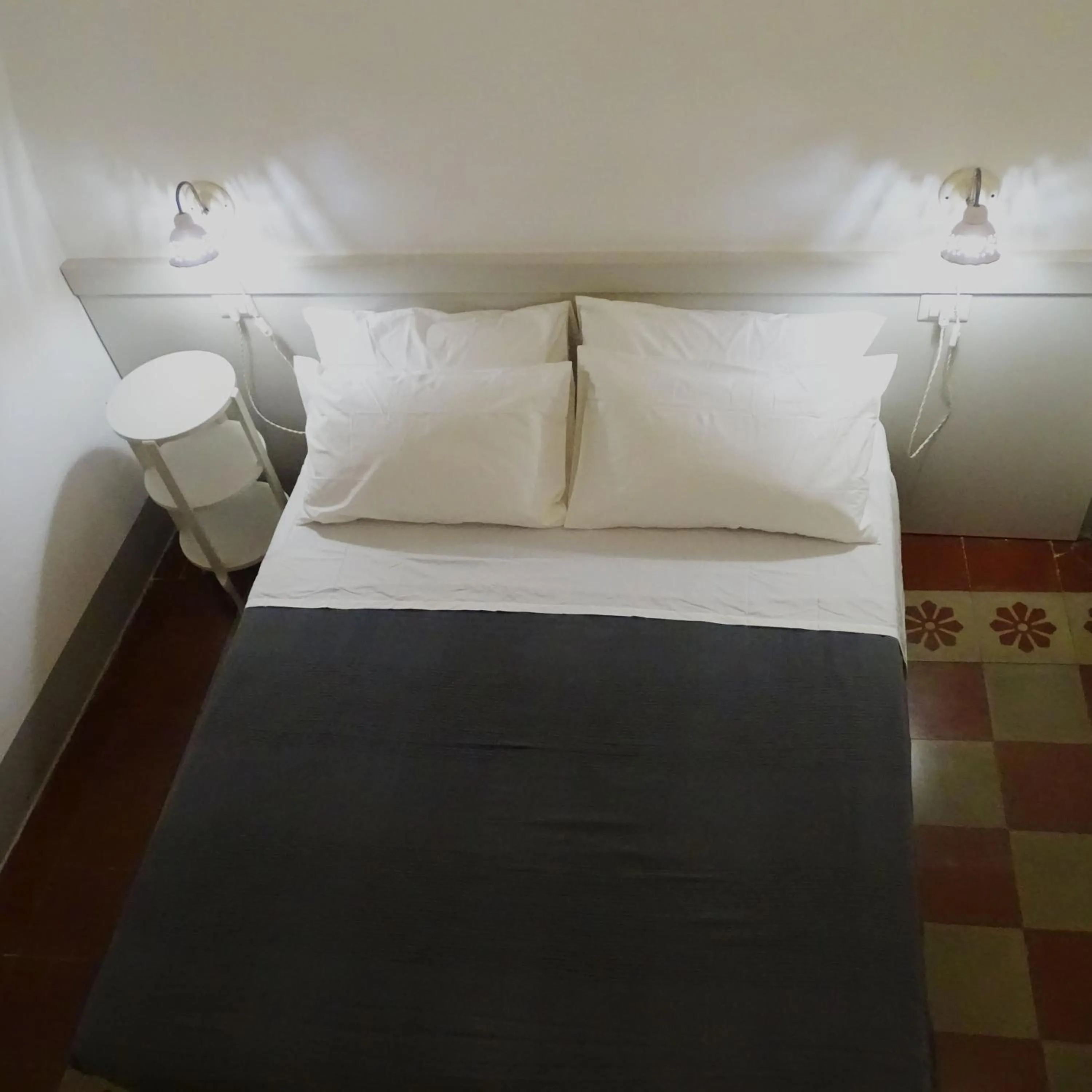Bed in Le Finestre Su Porta Carrese - Luxury Rooms