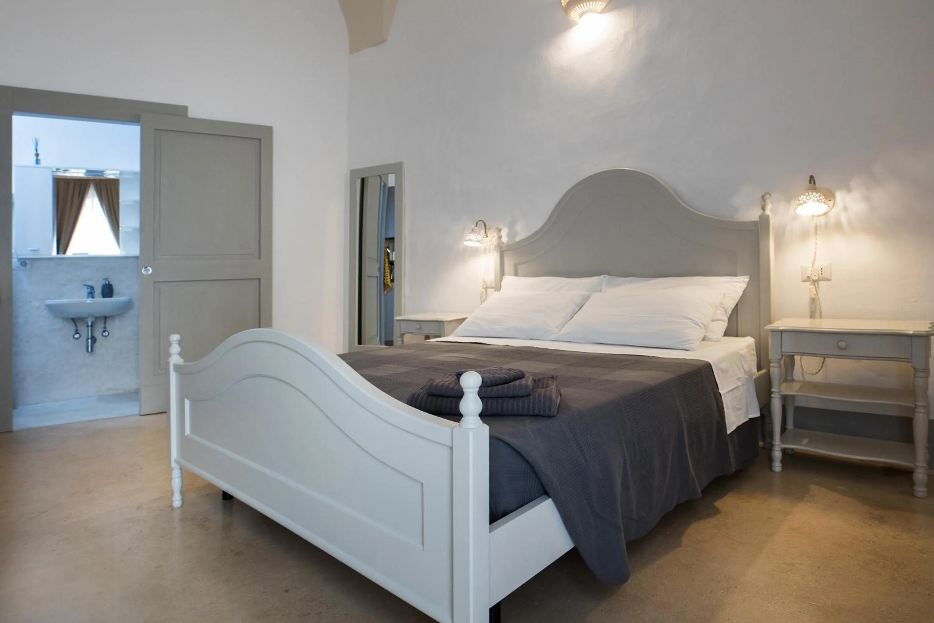 Bed in Le Finestre Su Porta Carrese - Luxury Rooms