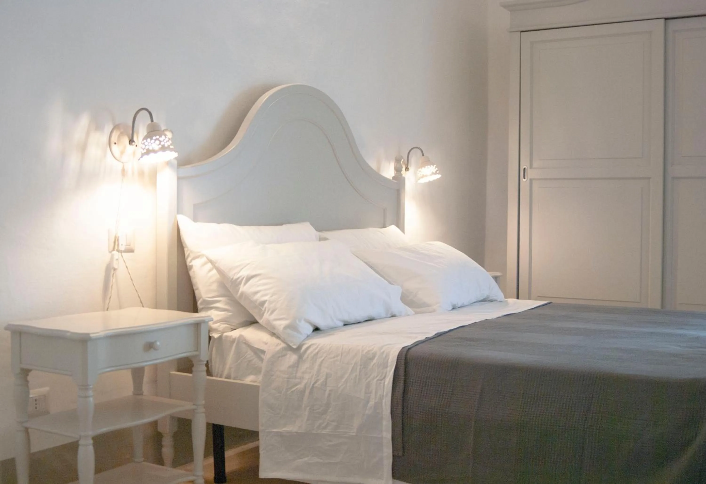 Bed in Le Finestre Su Porta Carrese - Luxury Rooms