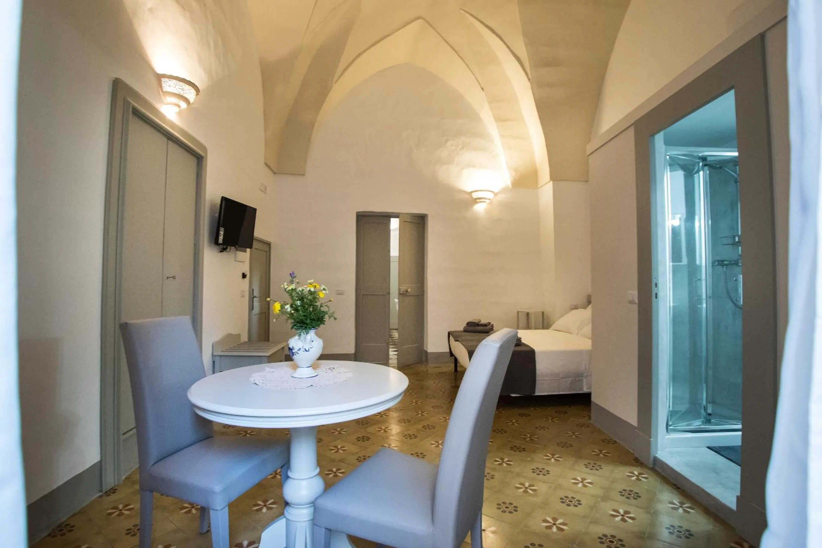 TV and multimedia in Le Finestre Su Porta Carrese - Luxury Rooms