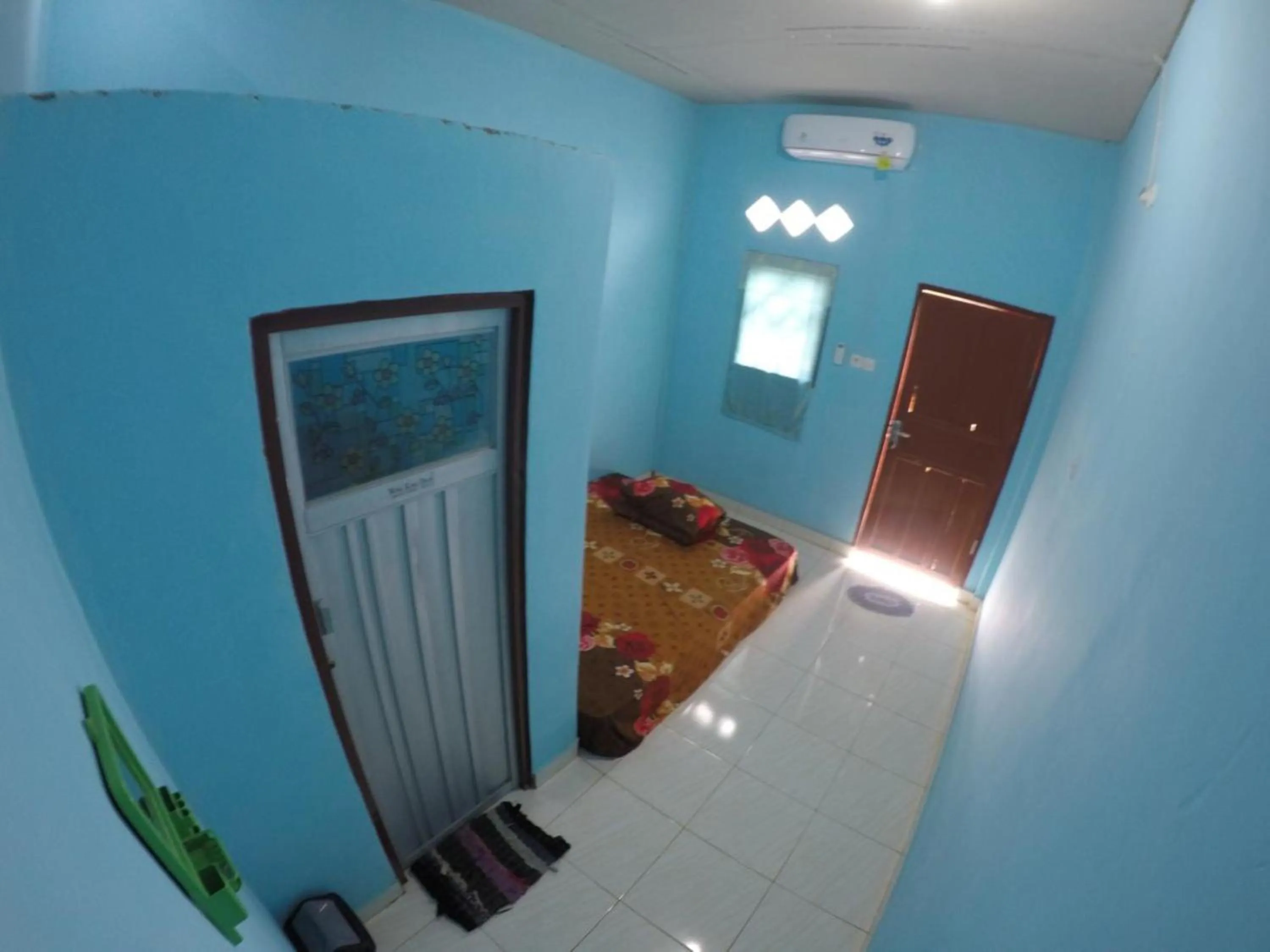 Bedroom in Penginapan asidik