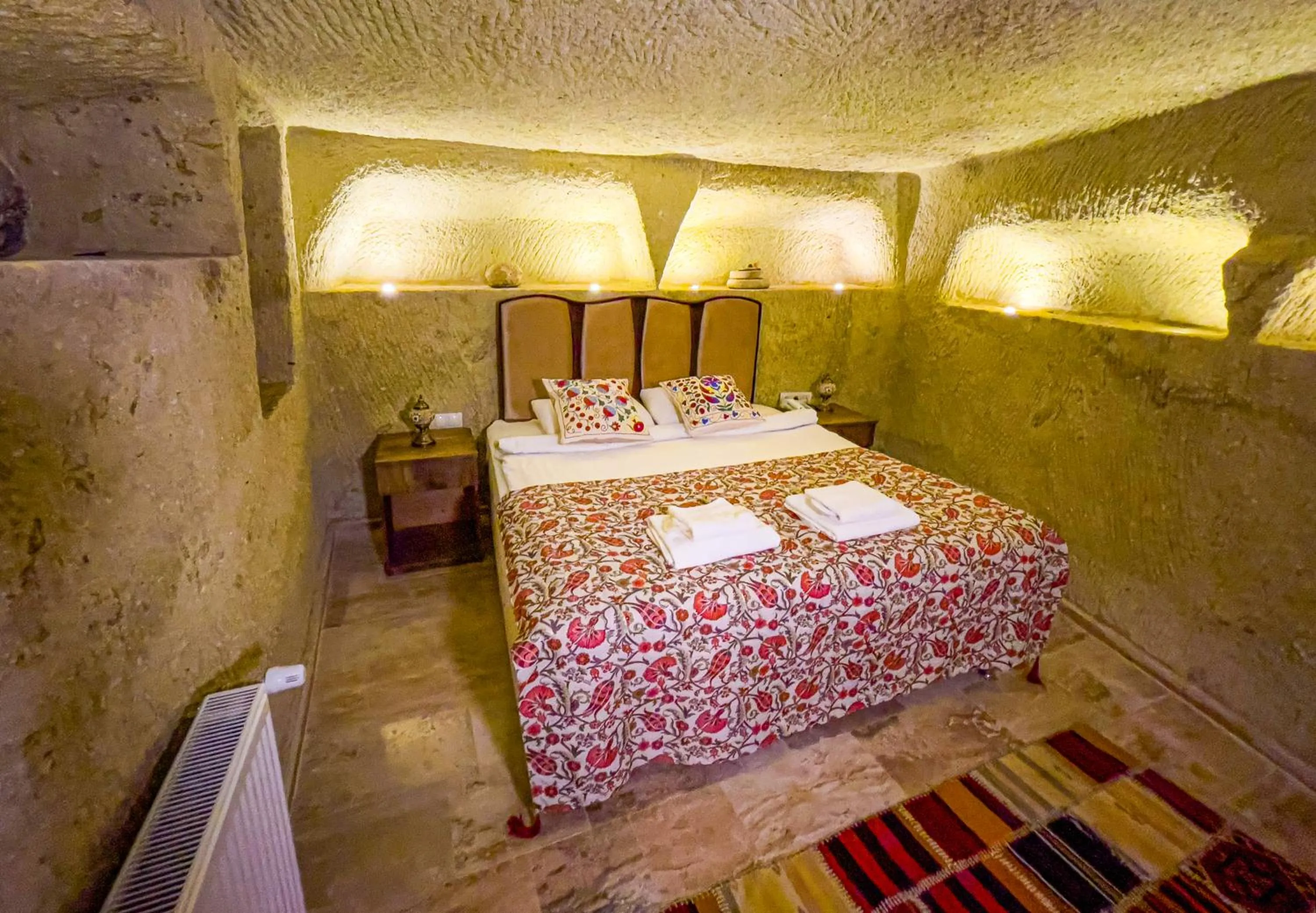 Bed in Heritage Cave Suites