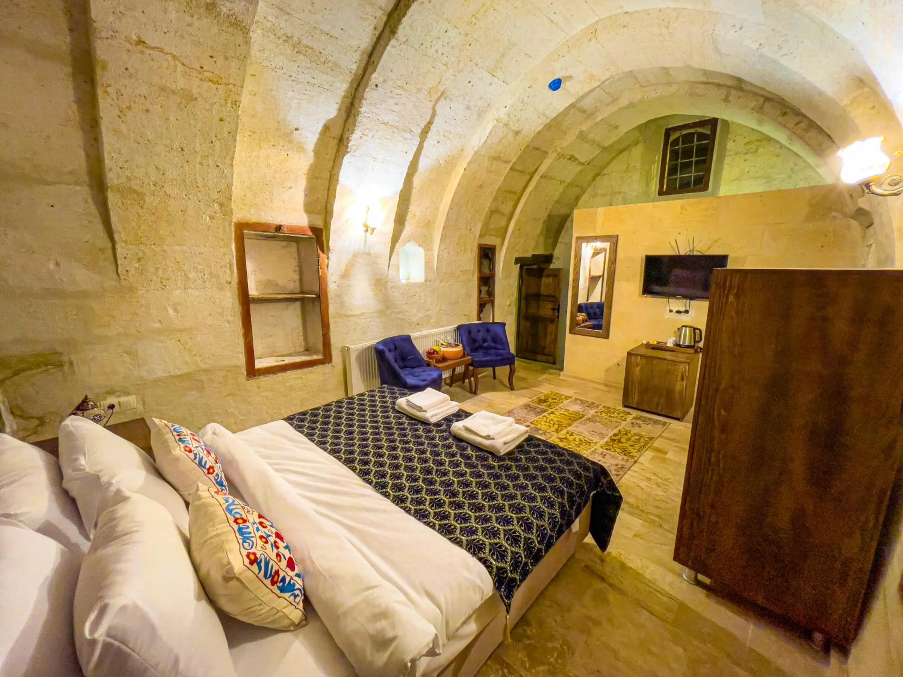 Bed in Heritage Cave Suites