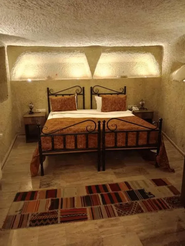 Bedroom, Bed in Heritage Cave Suites