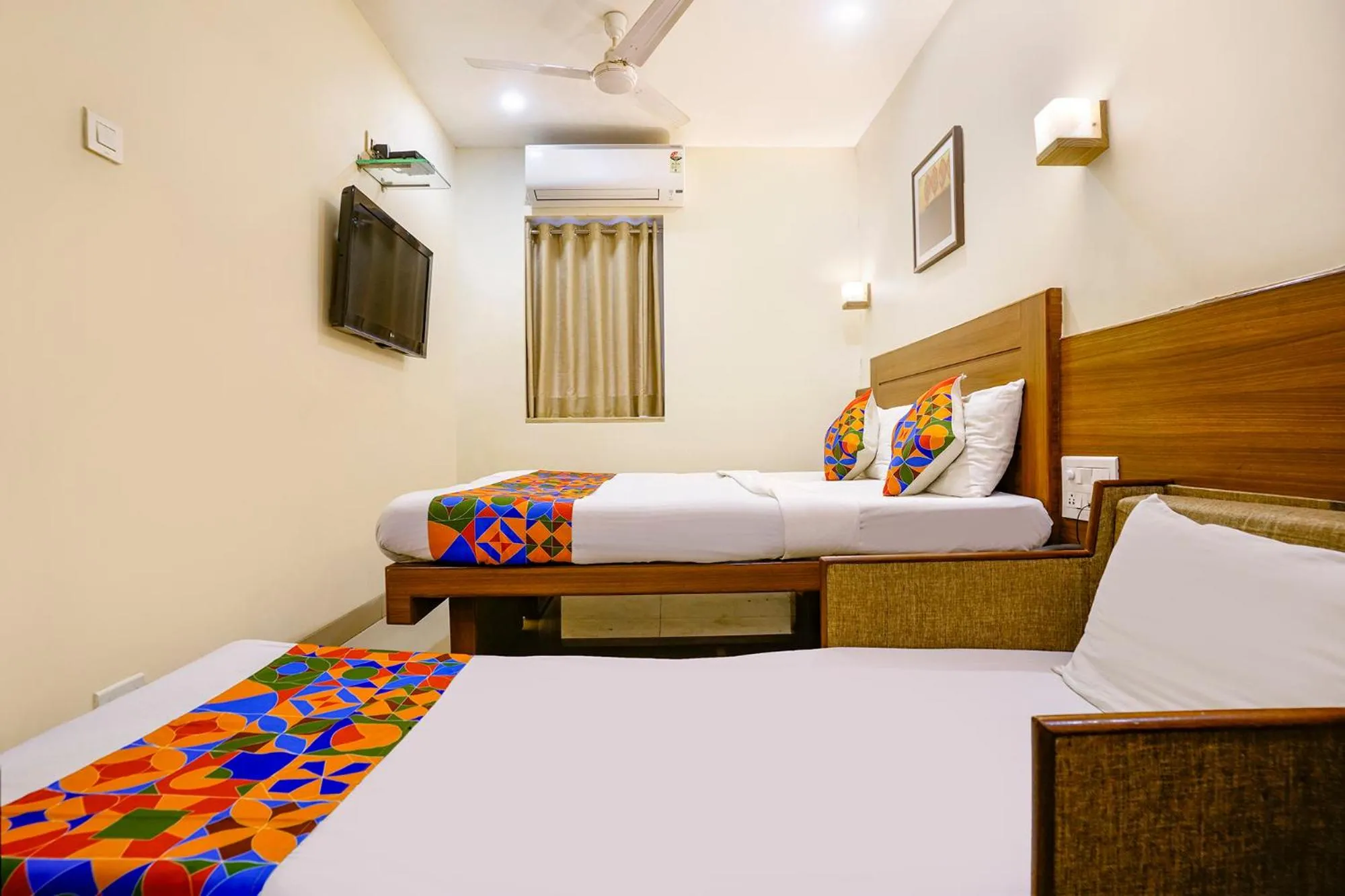 Bed in FabHotel Rahat
