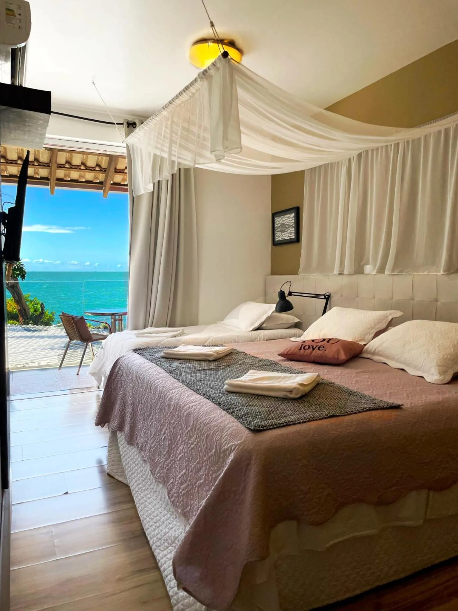 Bed in Pousada Ponta da Vigia