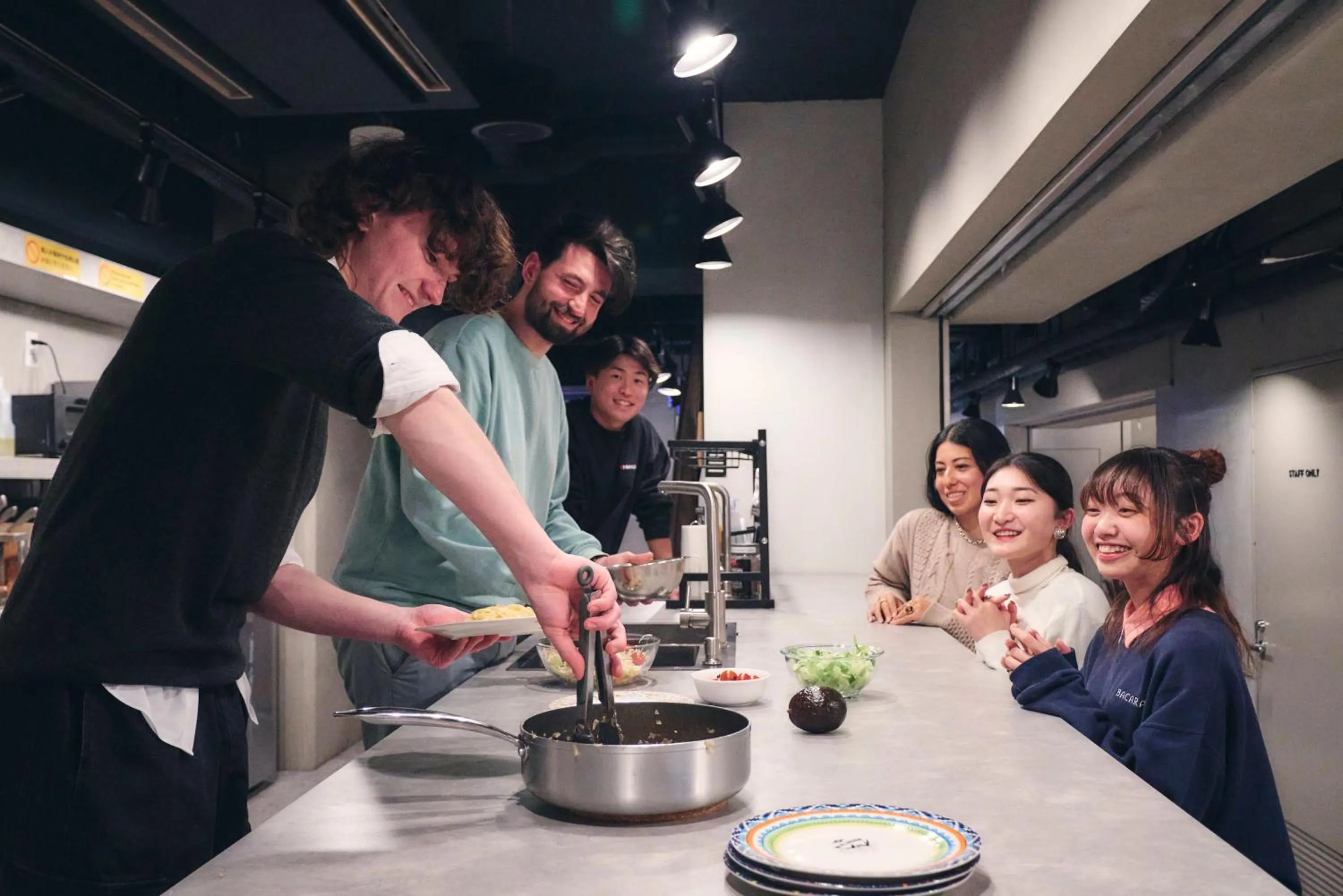 Communal kitchen in &AND HOSTEL SHINSAIBASHI EAST