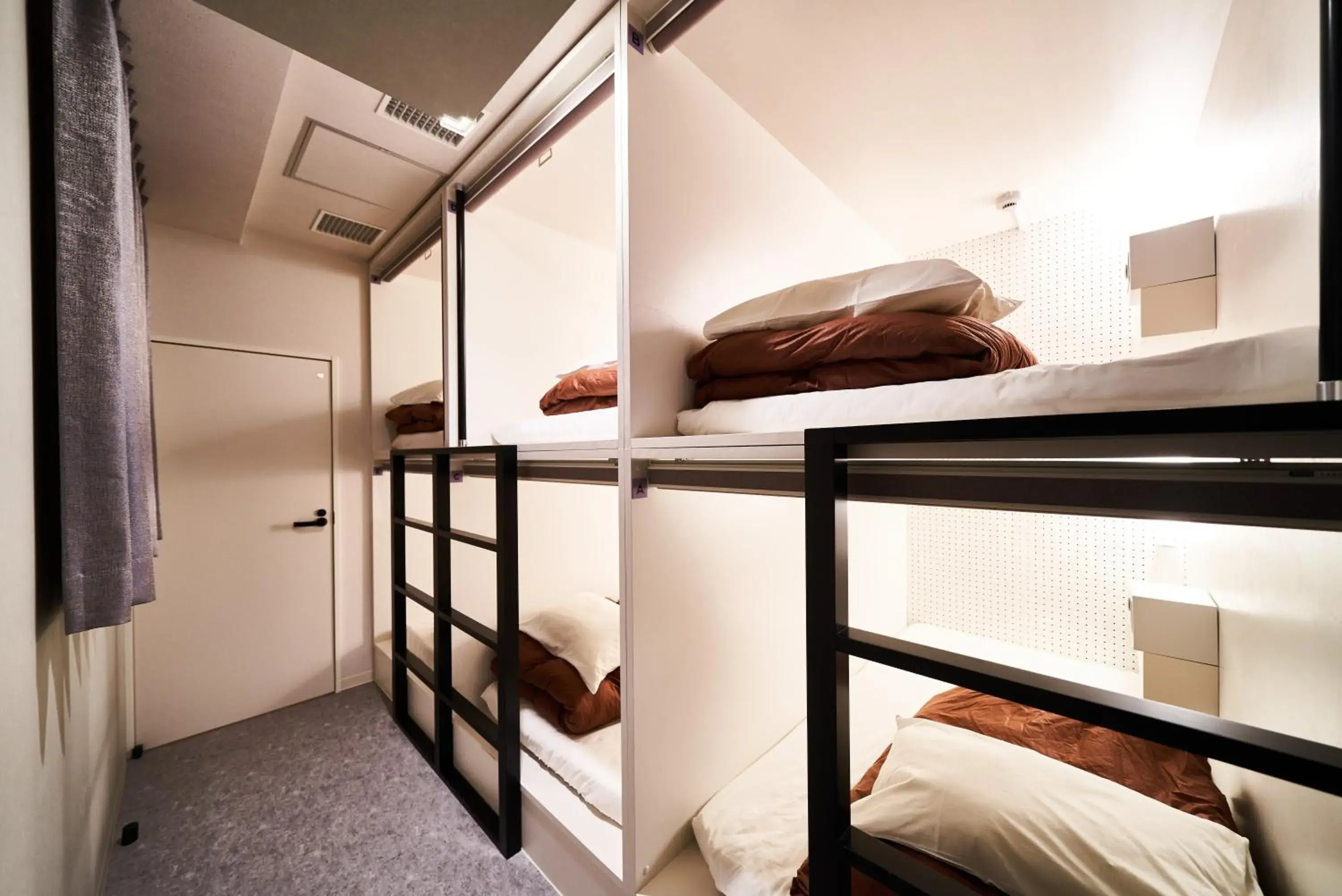 Photo of the whole room, Bed in &AND HOSTEL SHINSAIBASHI EAST Photo of the whole room, Bed in &AND HOSTEL SHINSAIBASHI EAST