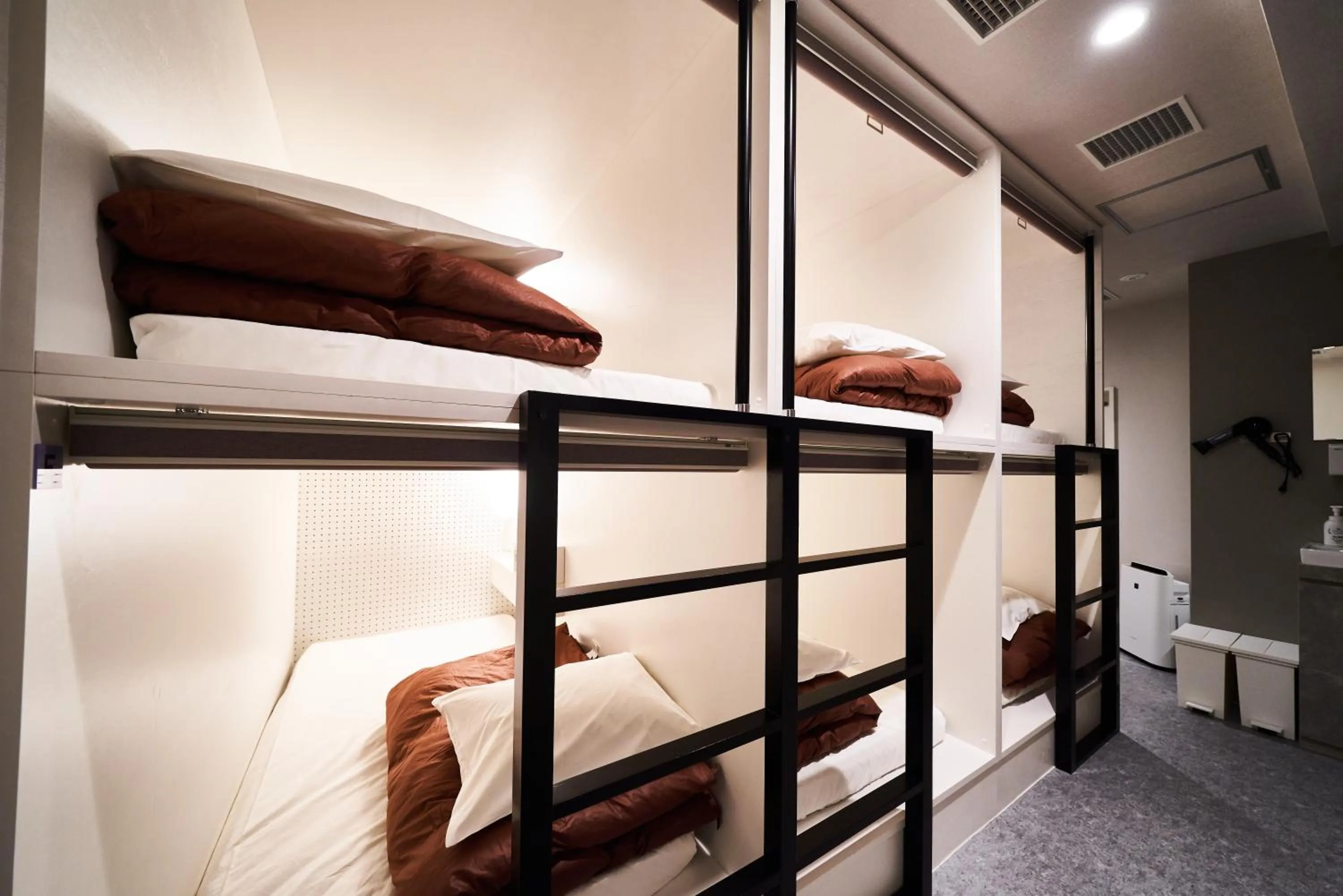 Photo of the whole room, Bed in &AND HOSTEL SHINSAIBASHI EAST