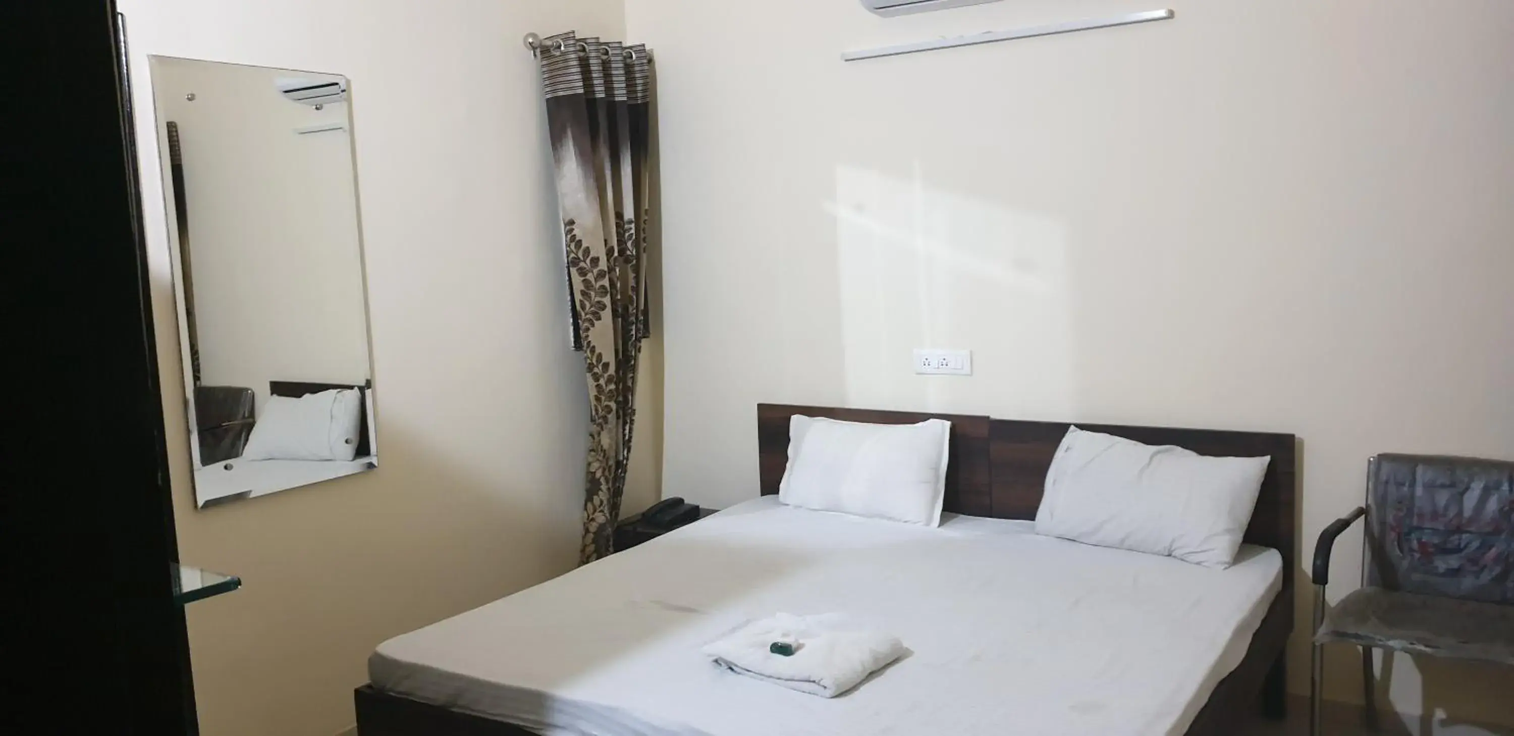 Double Room in Aanantham by Maliks Double Room in Aanantham by Maliks