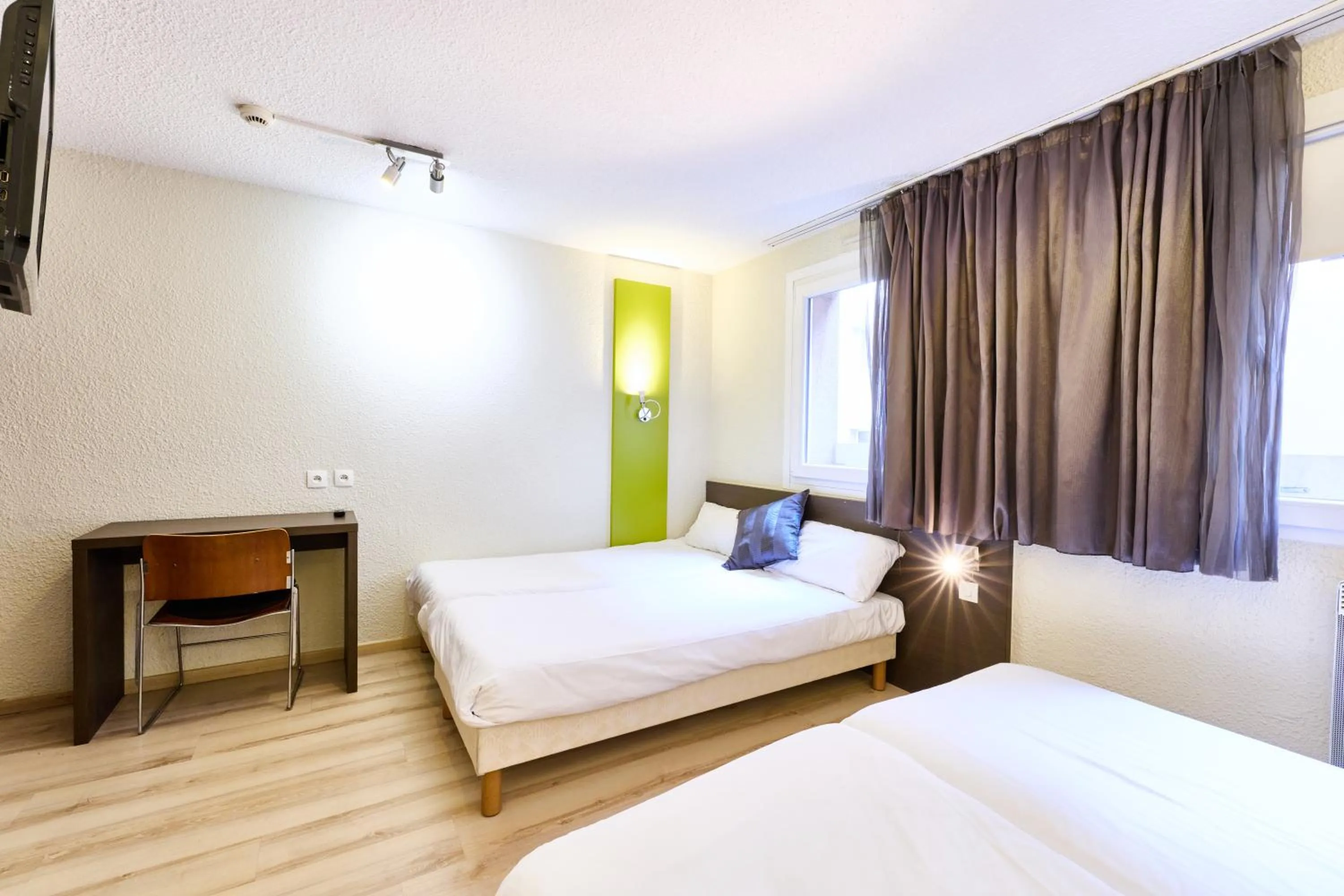 Bed in Hotel Primo Colmar Centre