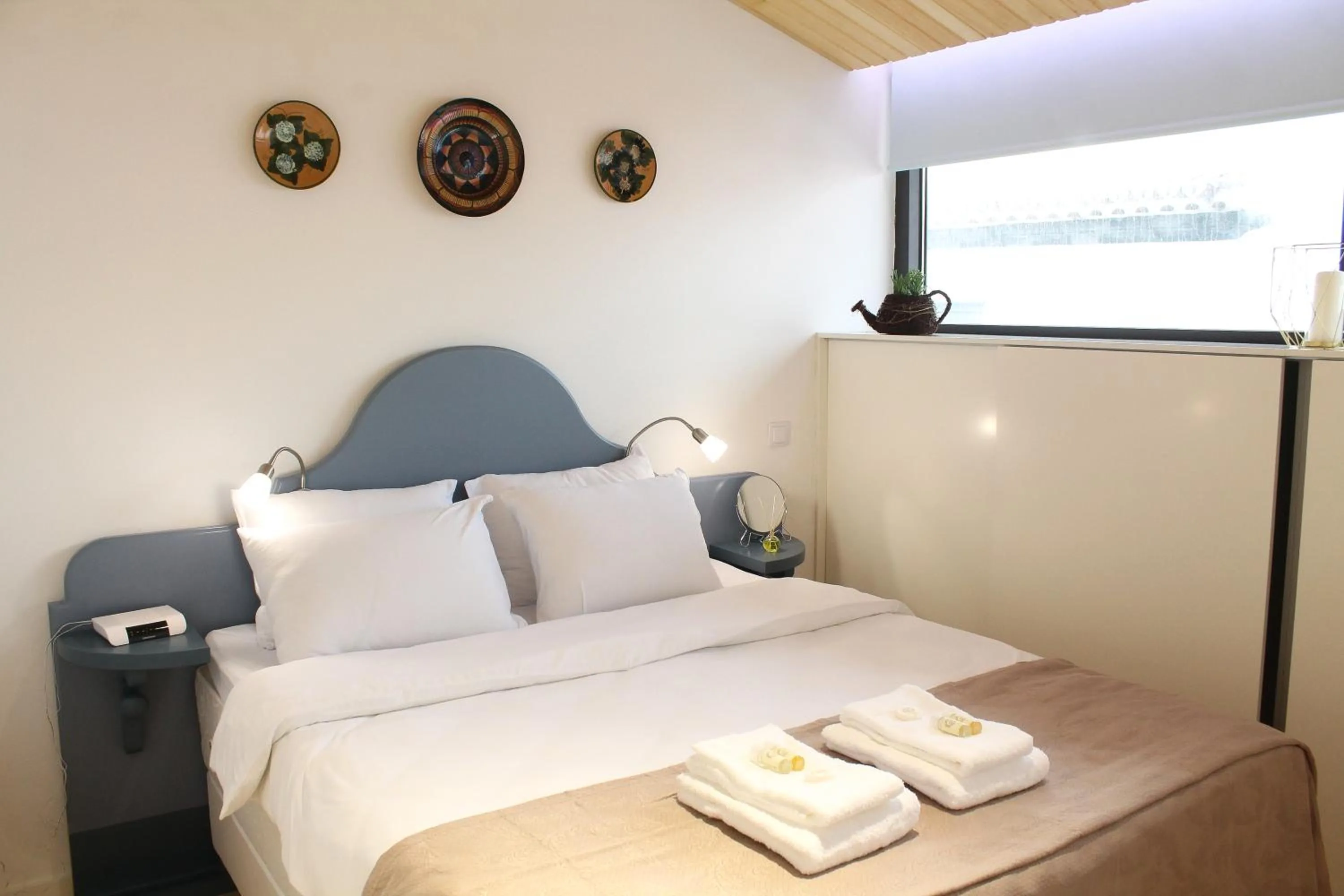 Bed in Marketplace Apartment 2