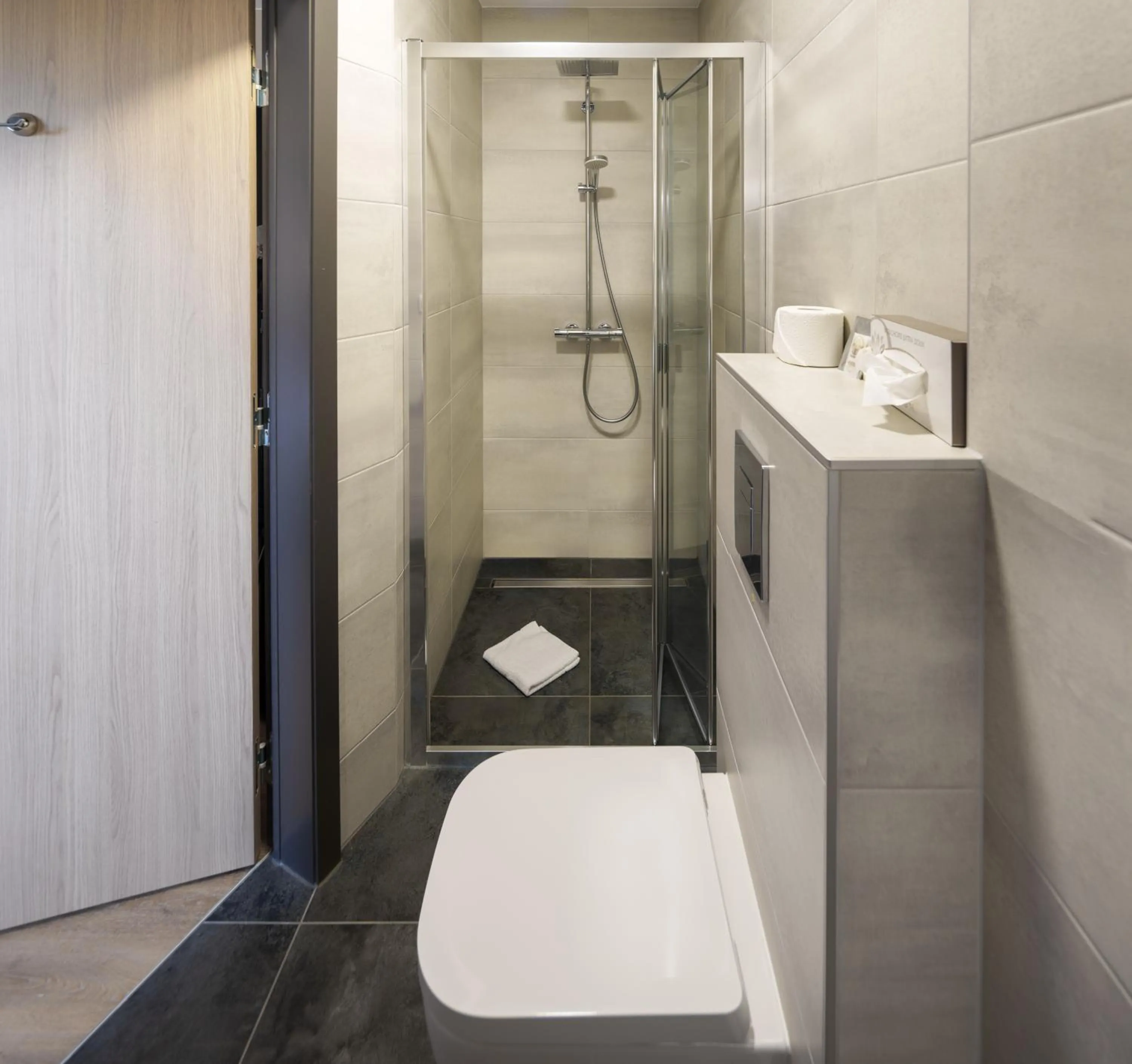 Shower in Logis Hôtel Restaurant Ritter'Hoft