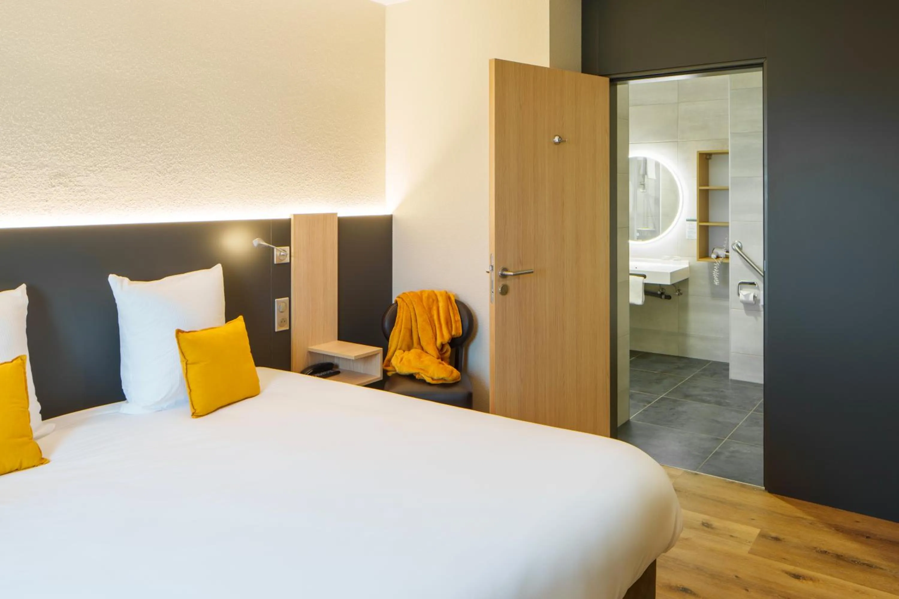 Bed in Logis Hôtel Restaurant Ritter'Hoft