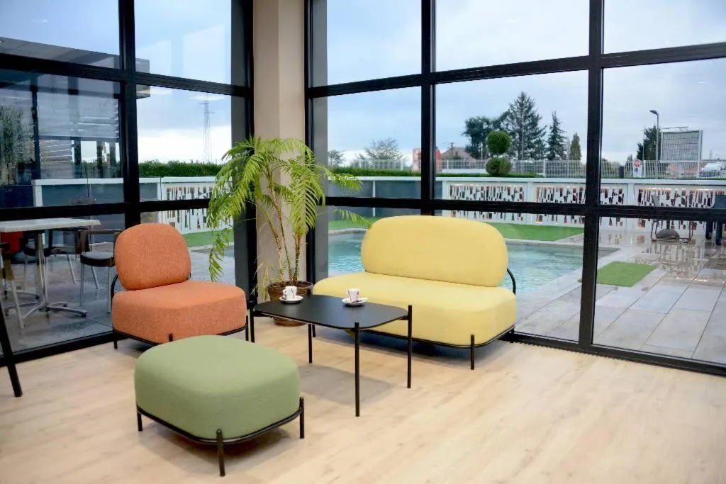 Living room in The Originals City, Hôtel Hélios, Roanne Nord
