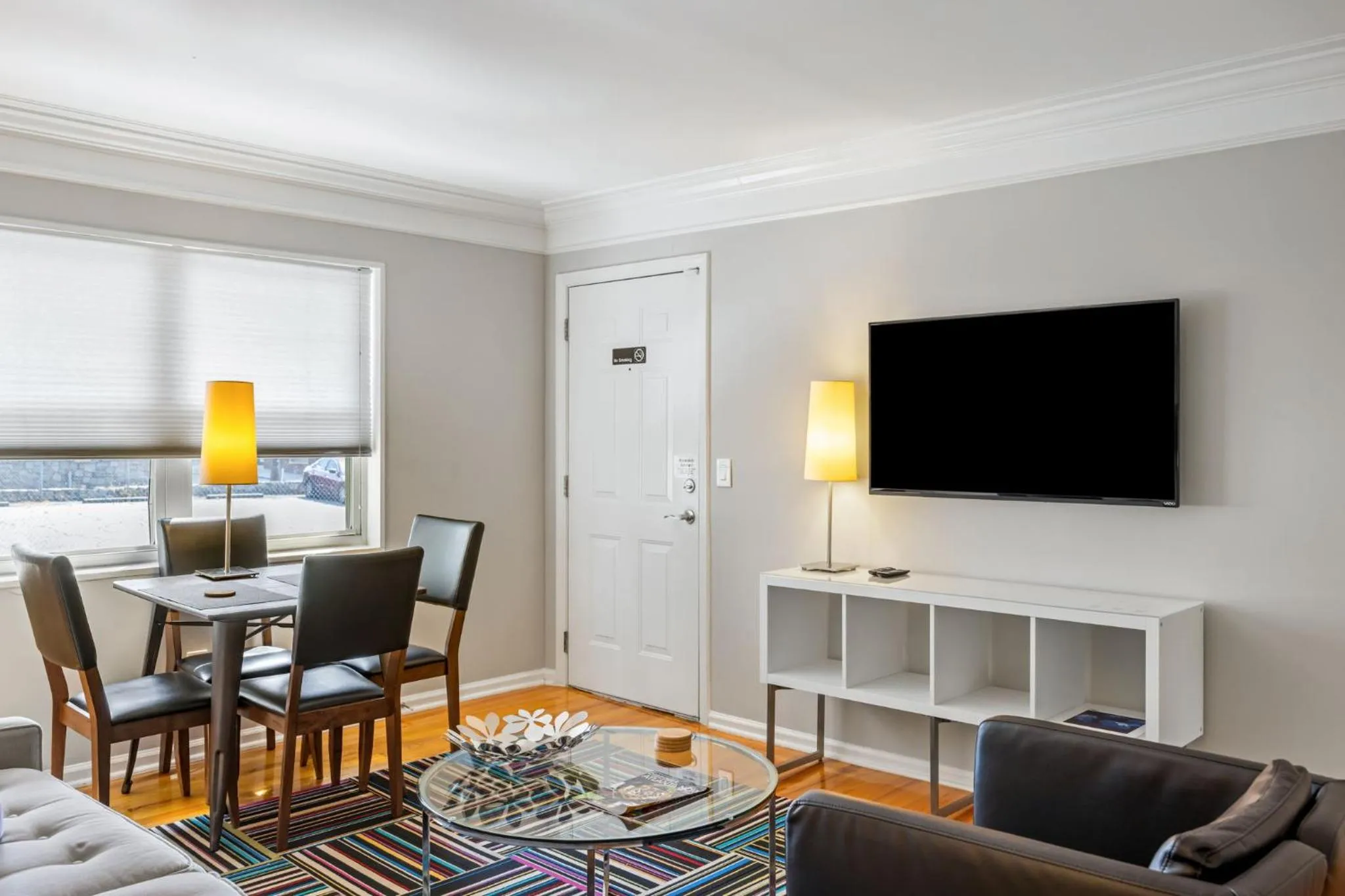 Communal lounge/ TV room in Brookwood Courtyard by BCA Furnished Apartments