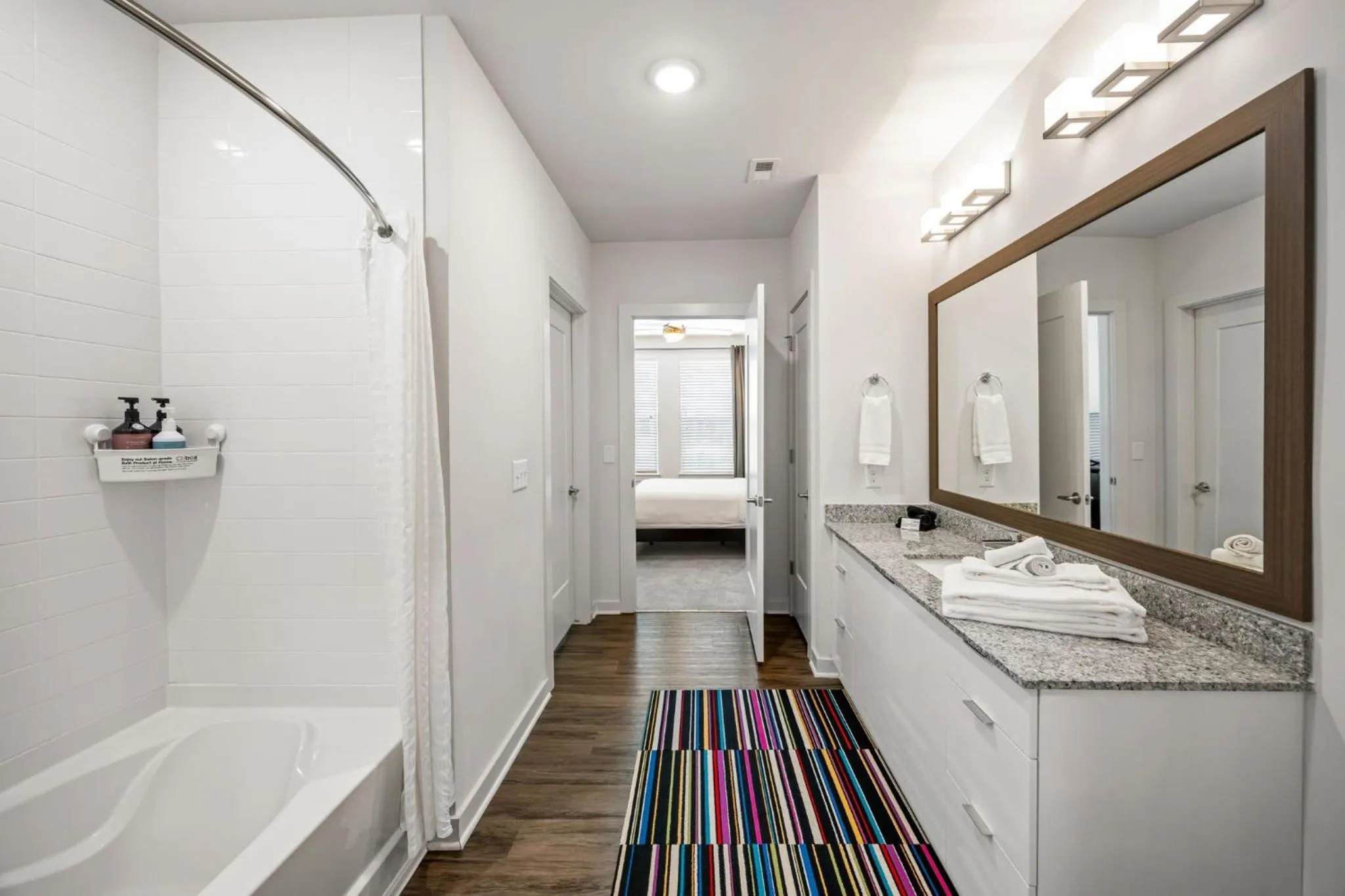 Toilet in Spectacular Apartments by BCA Furnished Apartments