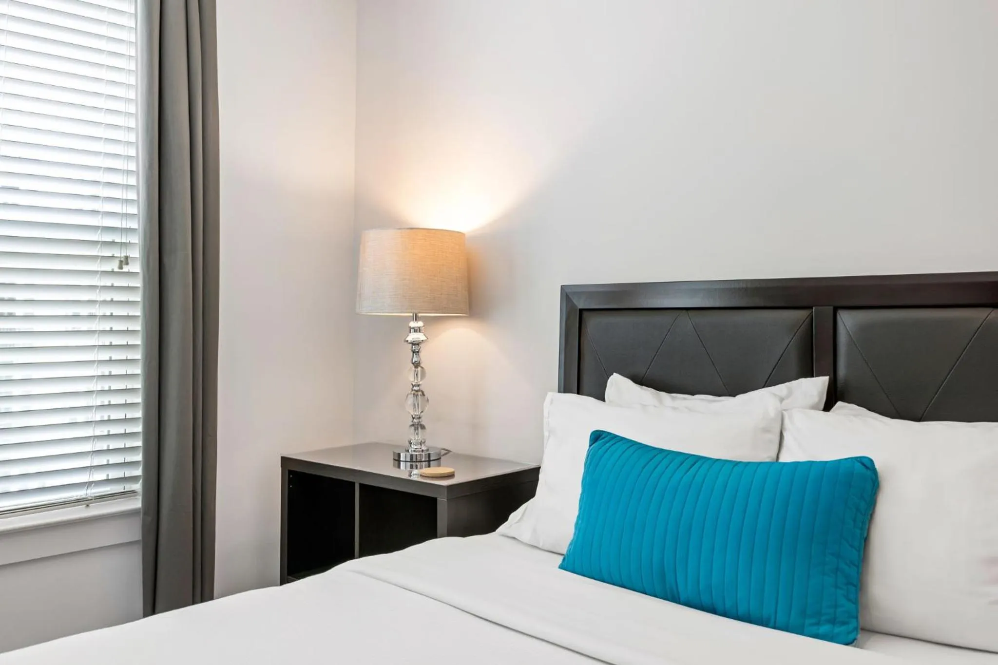 Bed in Spectacular Apartments by BCA Furnished Apartments