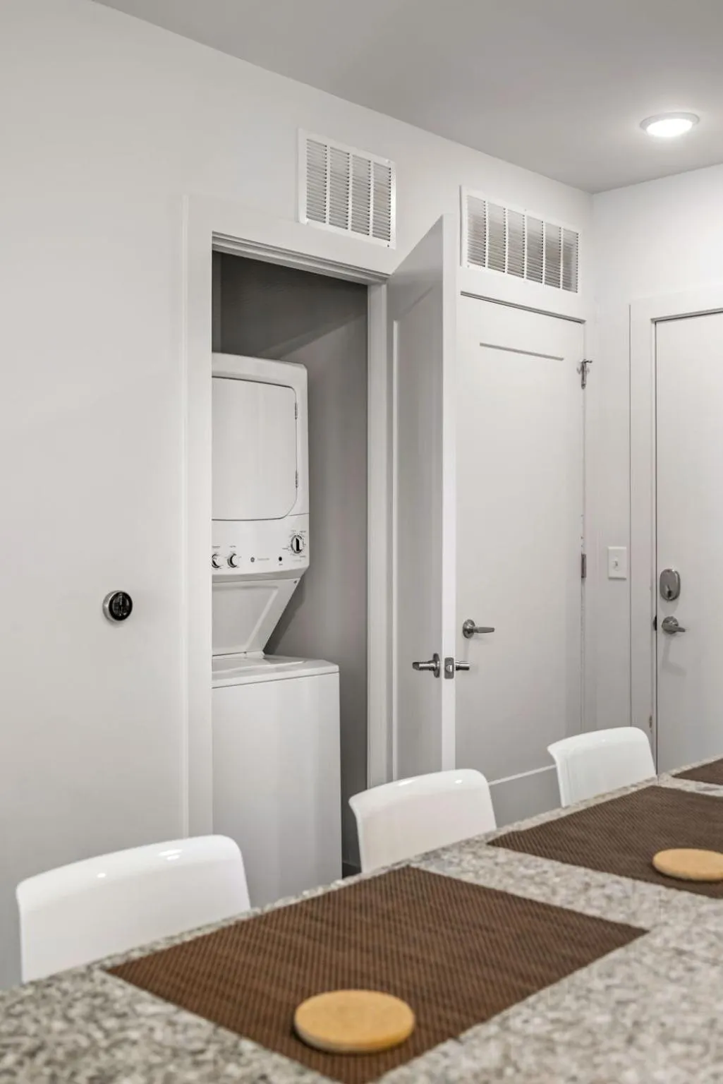 washing machine in Spectacular Apartments by BCA Furnished Apartments