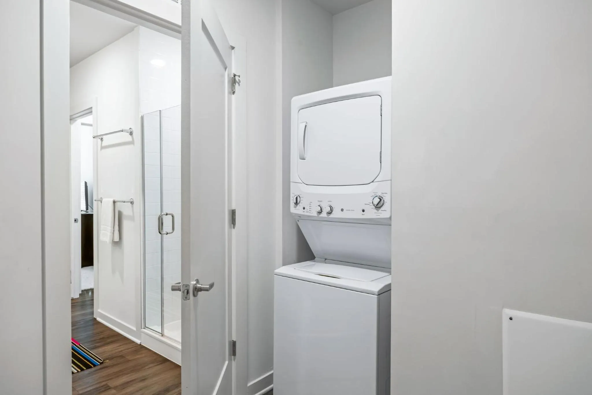 washing machine in Spectacular Apartments by BCA Furnished Apartments