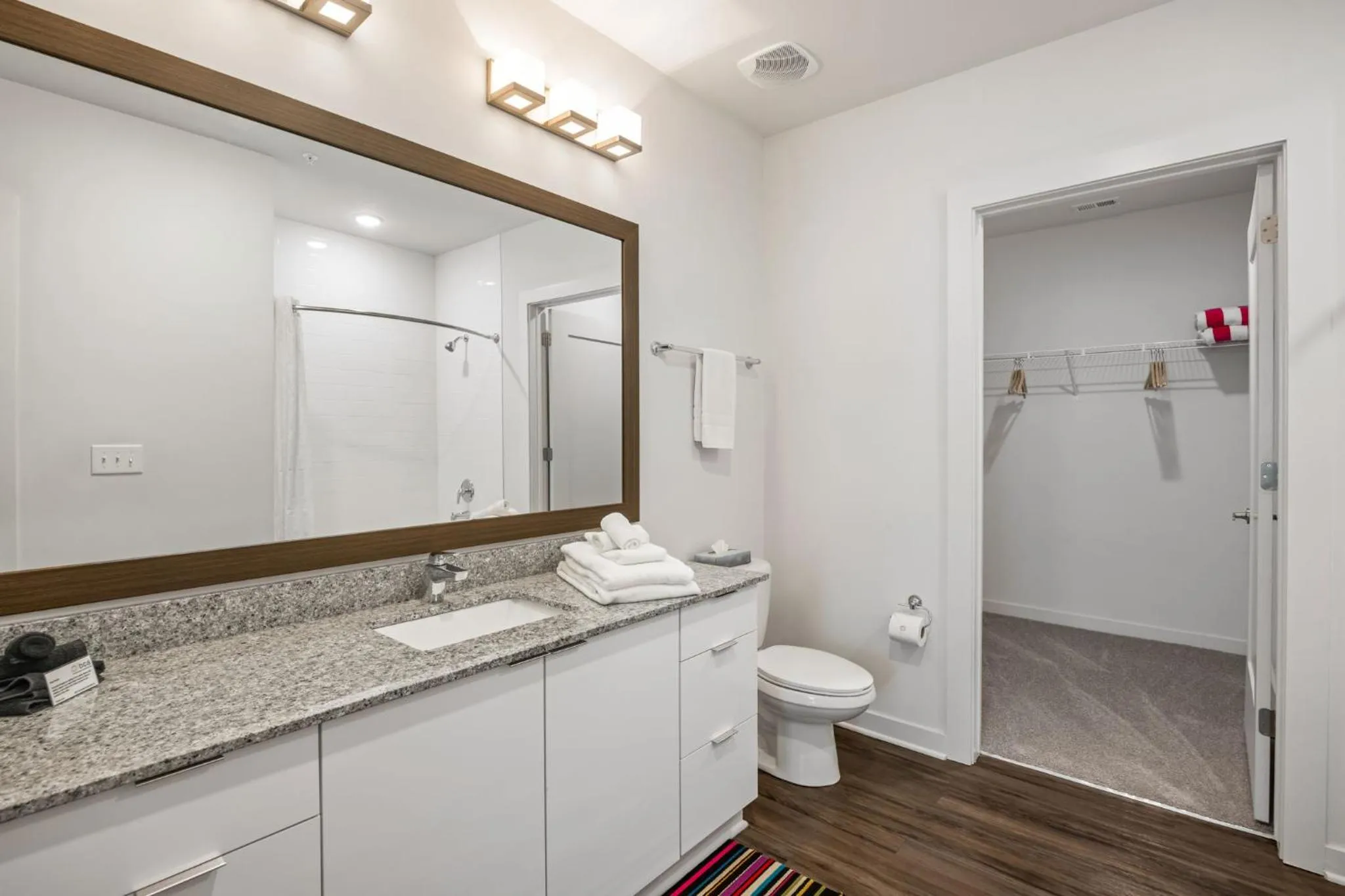 Toilet in Spectacular Apartments by BCA Furnished Apartments
