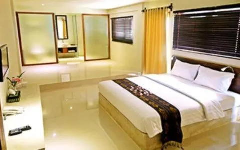 Bed in The Pade Dive Resort