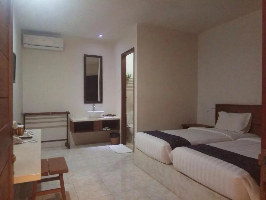 Bed in The Pade Dive Resort