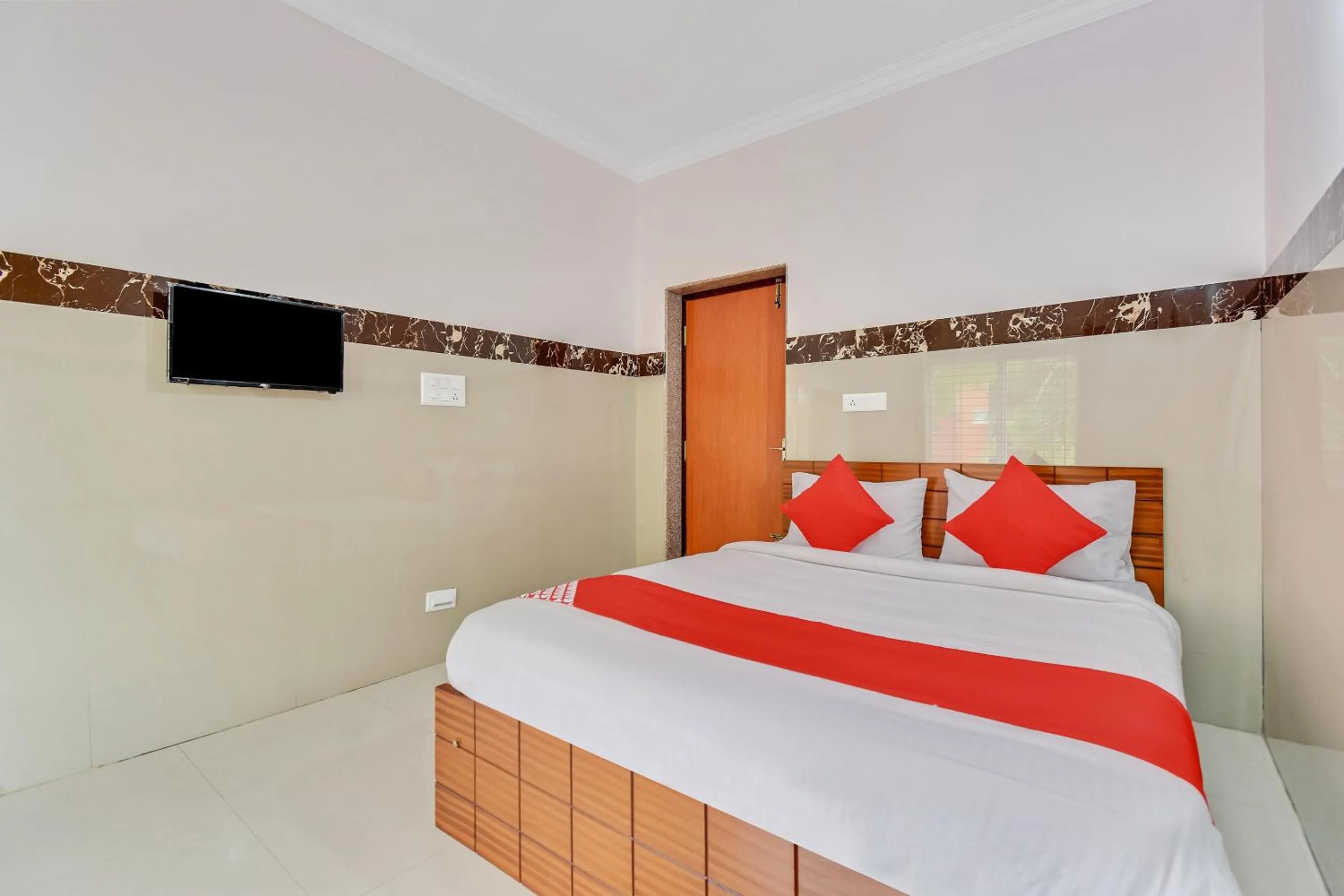 Bedroom, Bed in Hotel O Sri Sai Guru Comforts