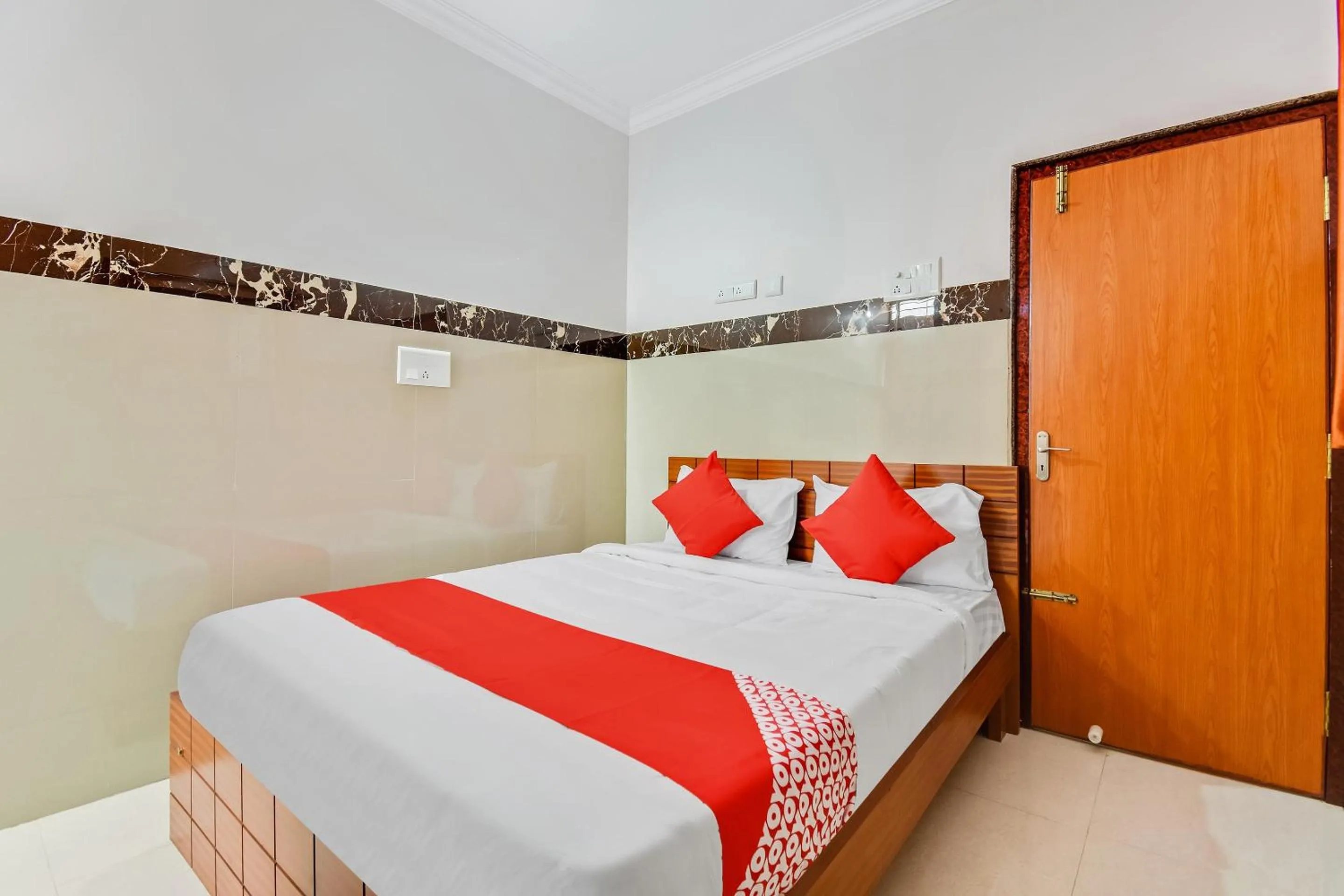 Bedroom, Bed in Hotel O Sri Sai Guru Comforts