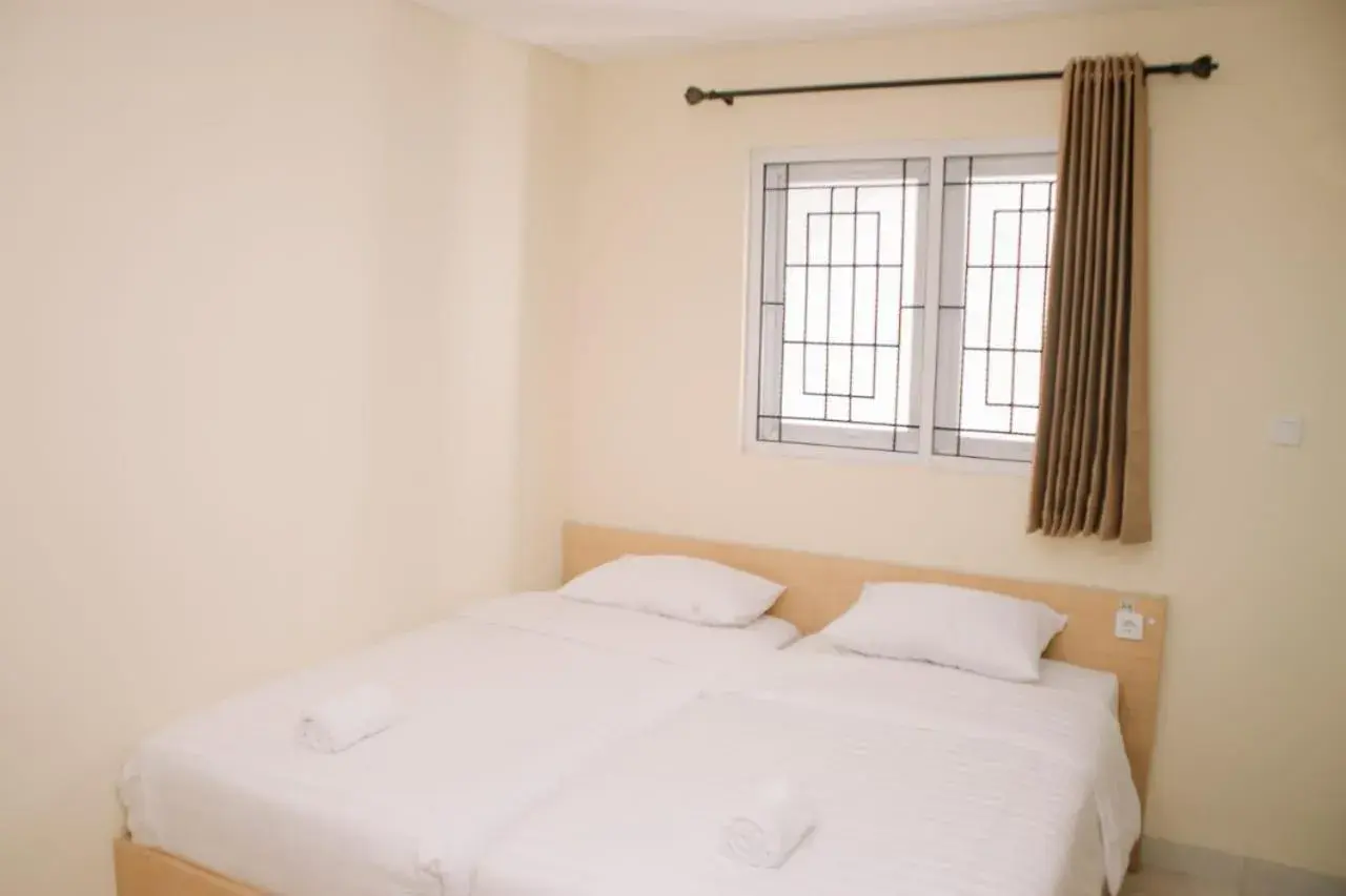 Bed in Merlin Hotel Bed in Merlin Hotel