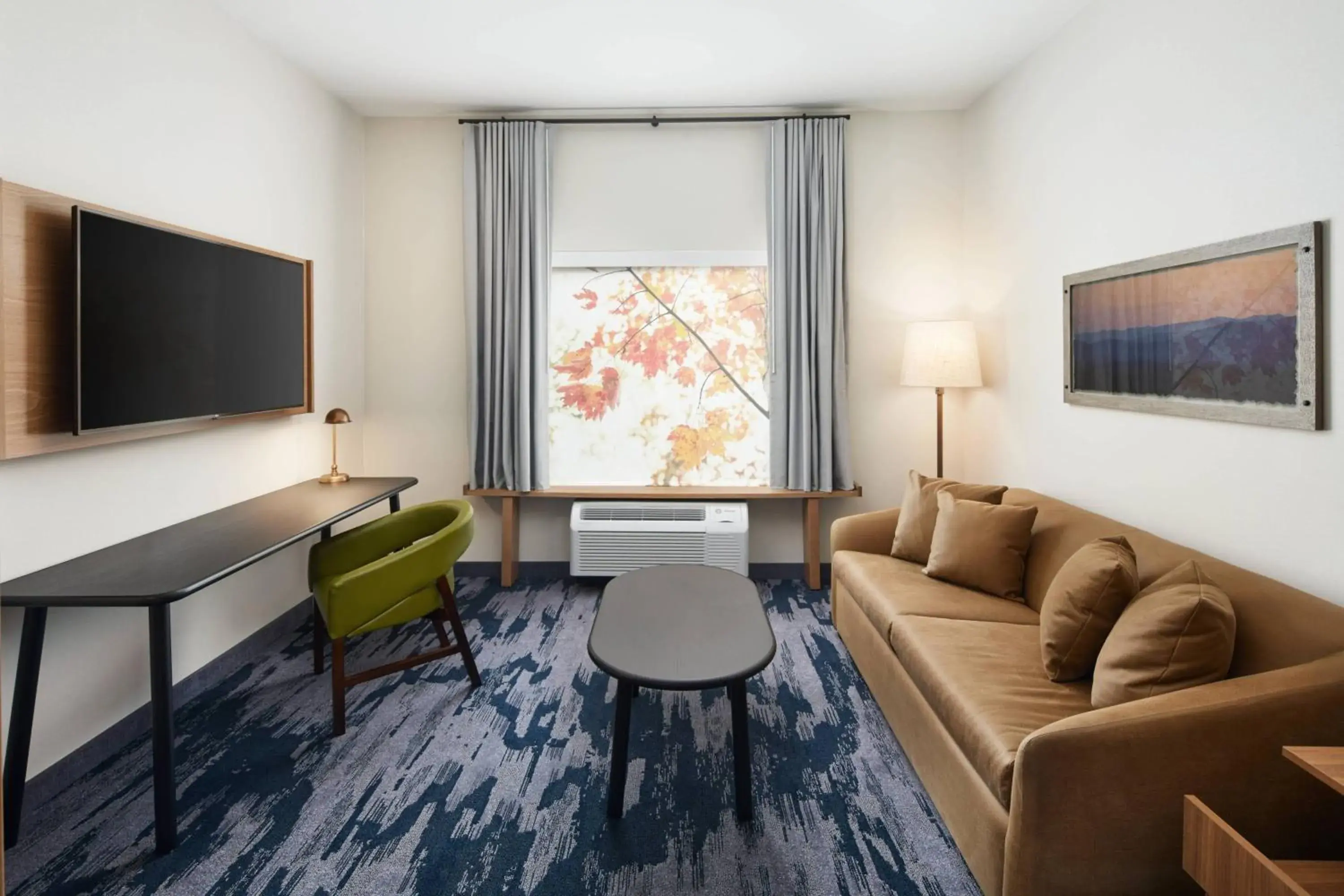 Living room in Fairfield Inn & Suites by Marriott Raleigh Wake Forest Living room in Fairfield Inn & Suites by Marriott Raleigh Wake Forest