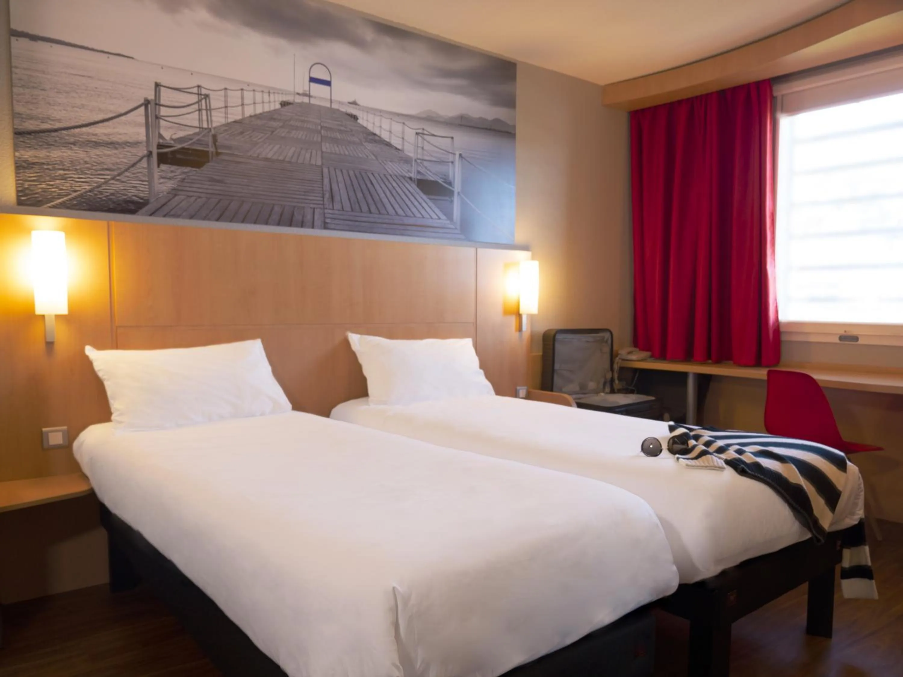 Bed in ibis Cannes Mandelieu